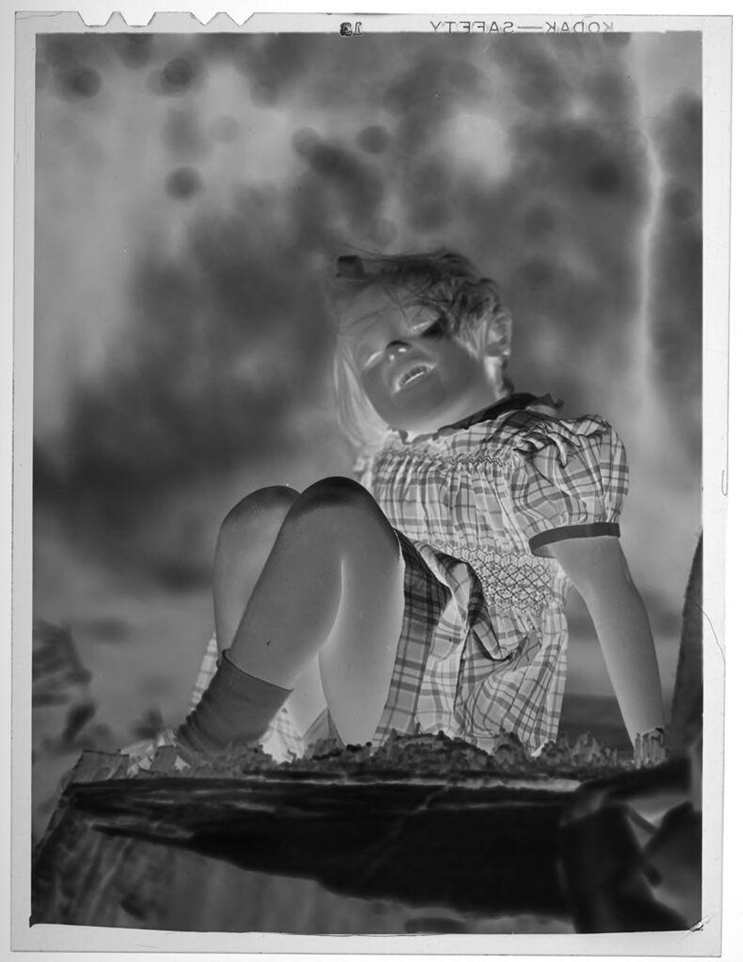 Untitled (girl in checkered dress) by Lucian and Mary Brown