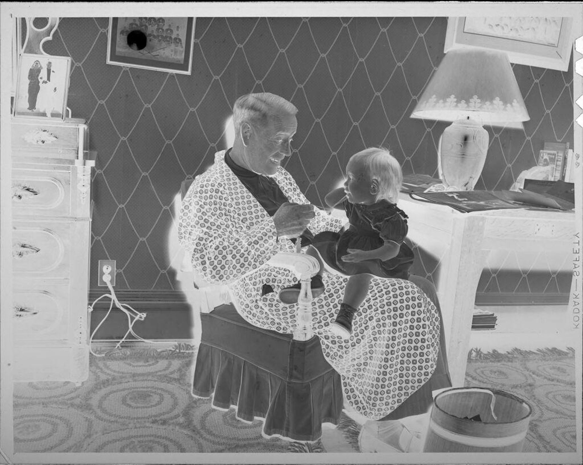 Untitled (baby on grandffather's lap) by Lucian and Mary Brown