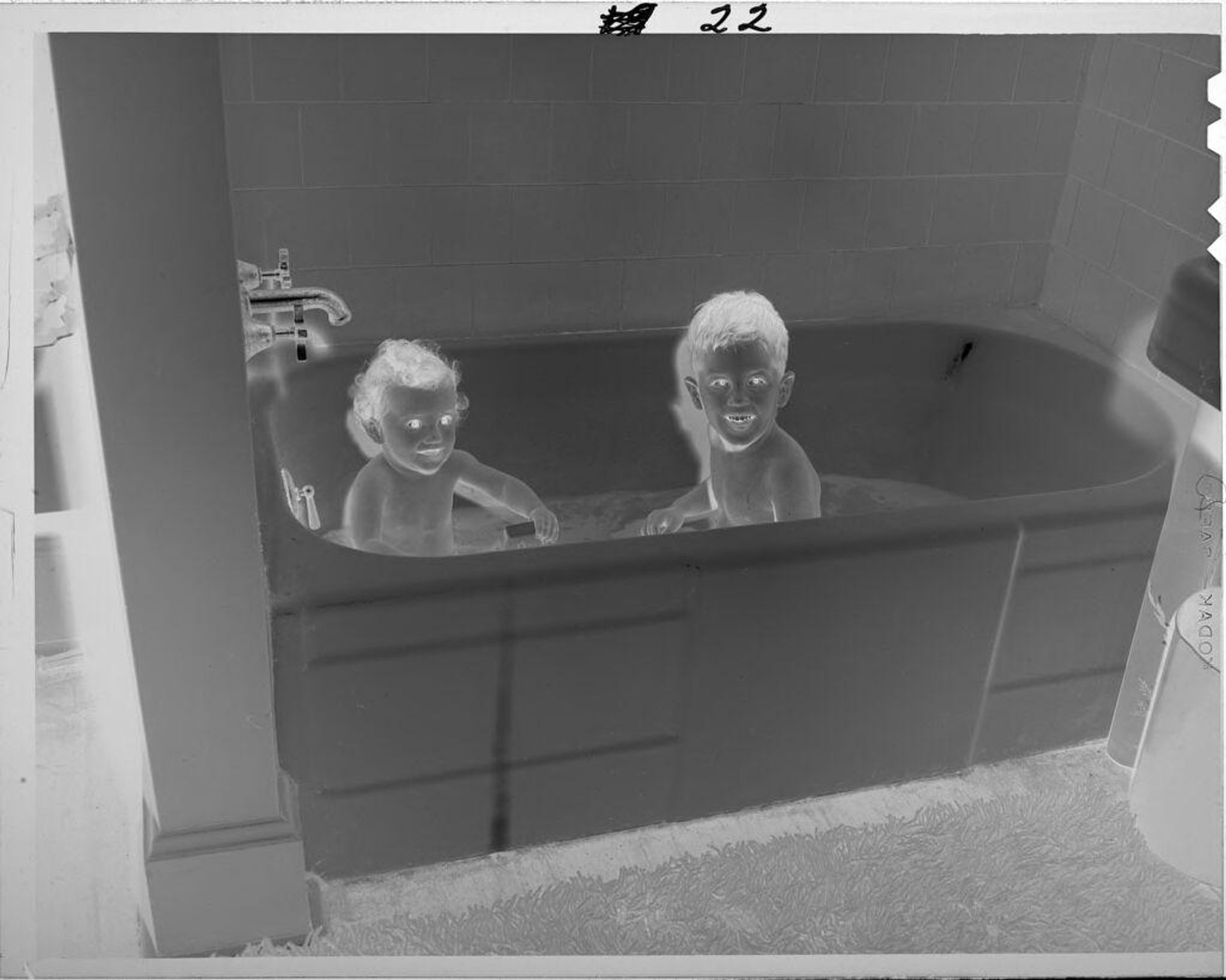 Untitled (two children in bathtub) by Lucian and Mary Brown