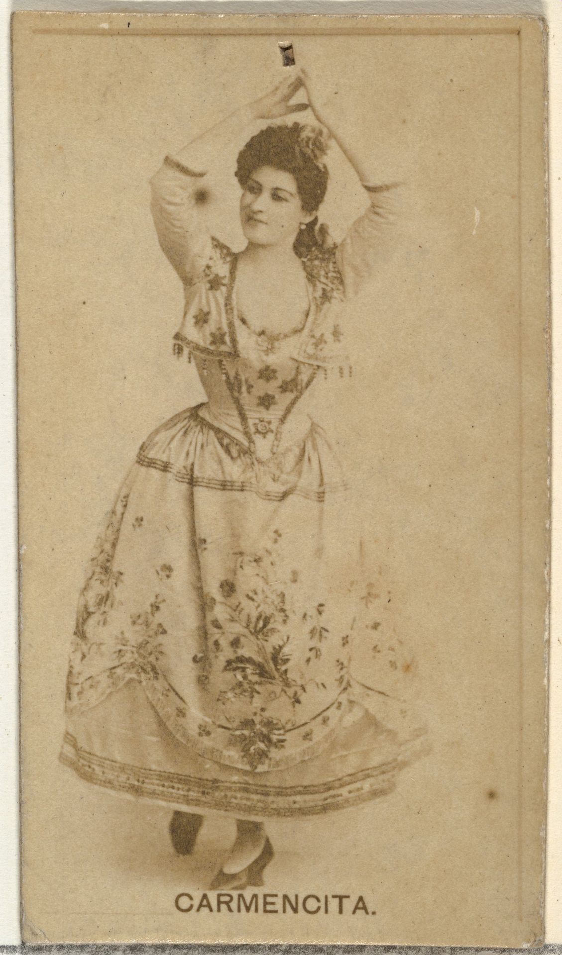Carmencita, from the Actors and Actresses series (N145-8) issued by Duke Sons & Co. to promote Duke Cigarettes by W. Duke, Sons & Co.