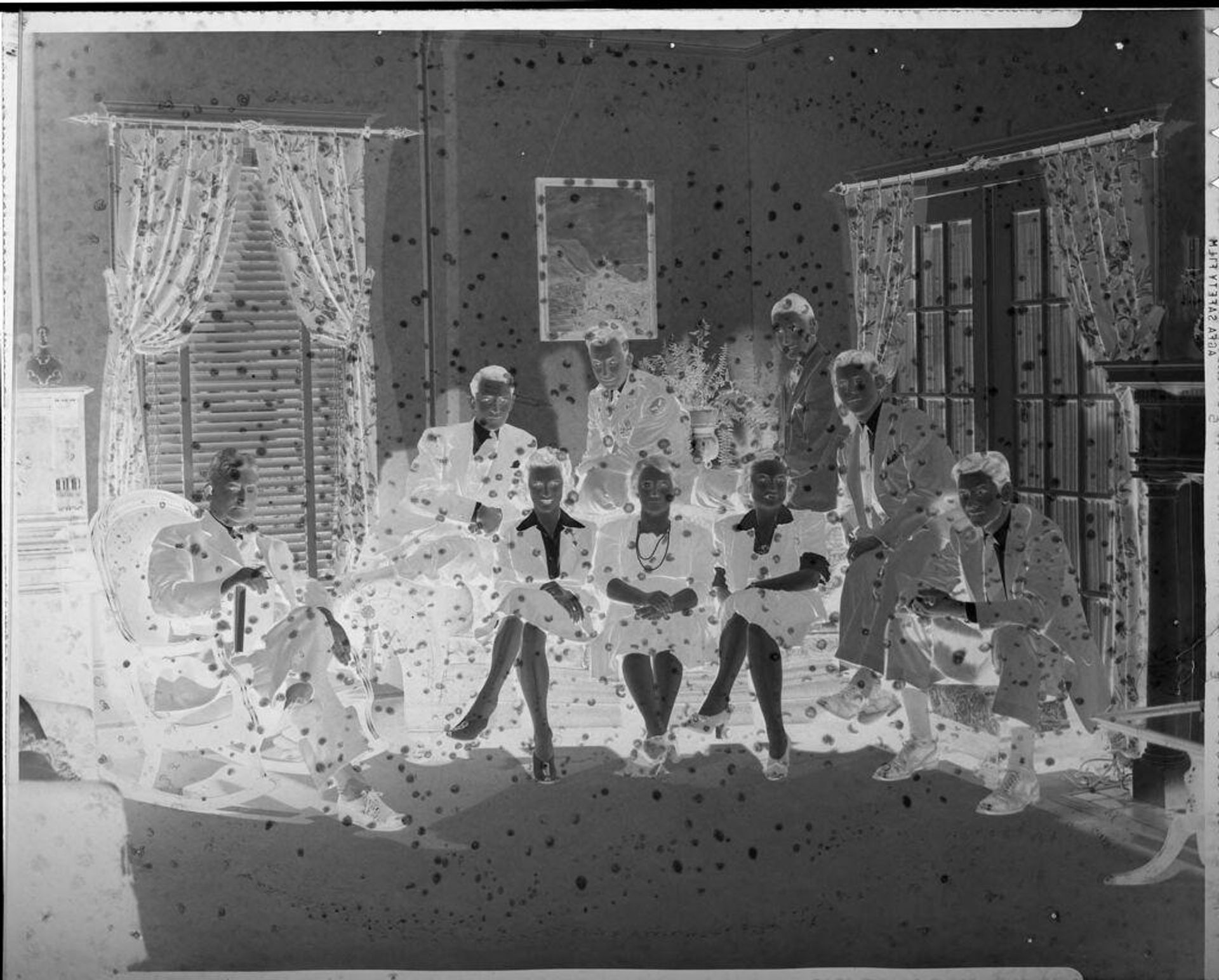 Untitled (family portrait in living room) by Hamblin Studio