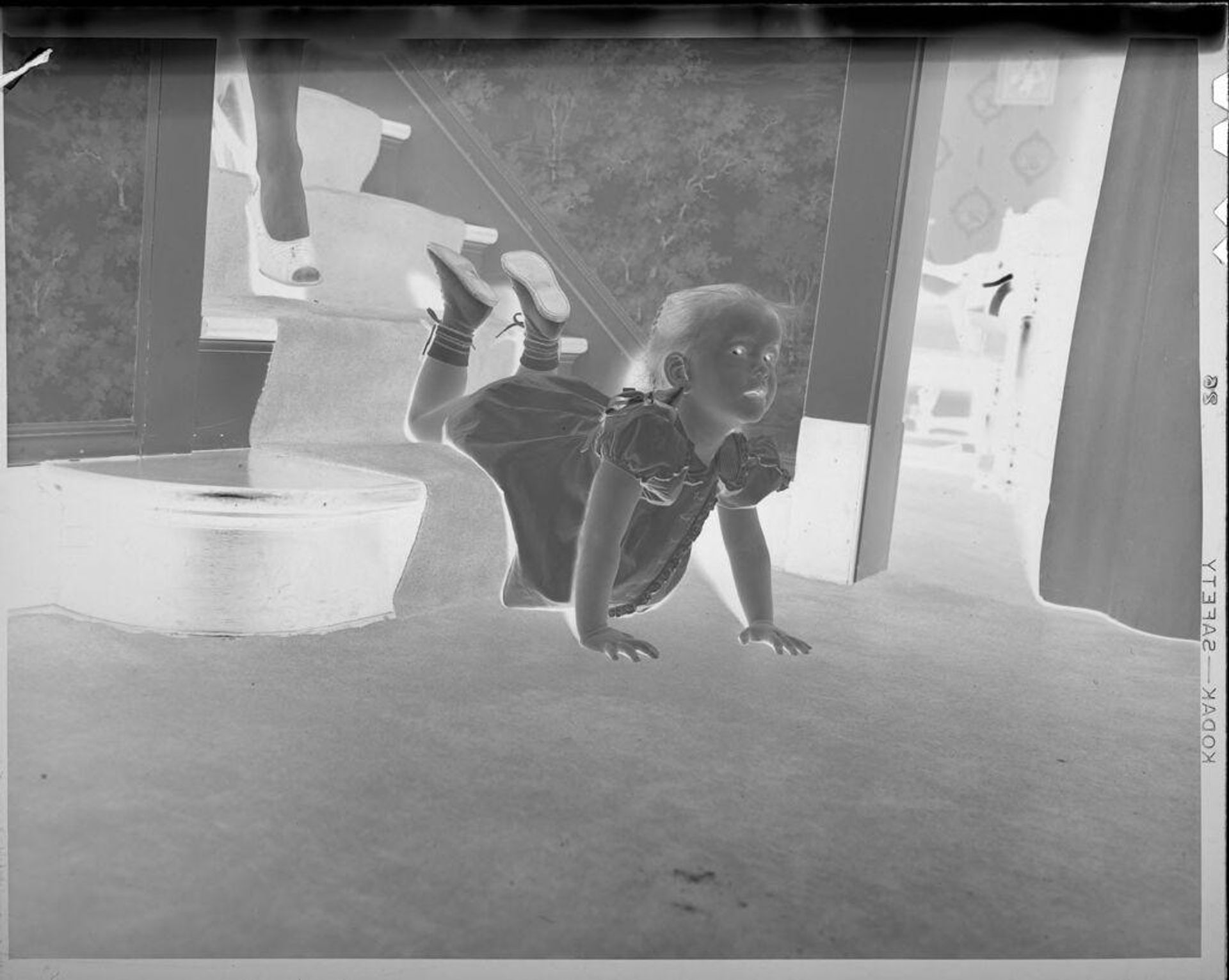 Untitled (girl on stairs) by Lucian and Mary Brown