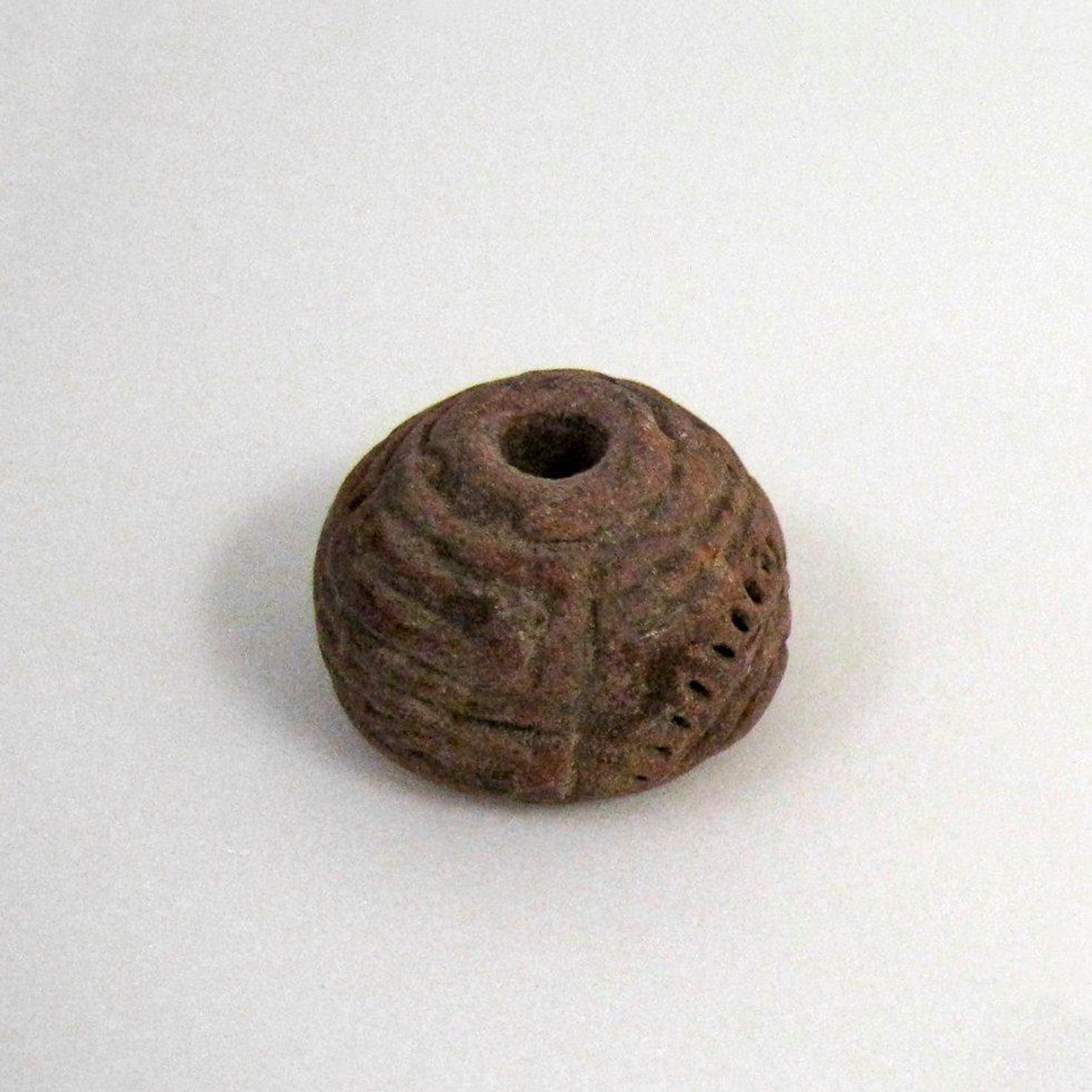 Spindle Whorl by Anonymous