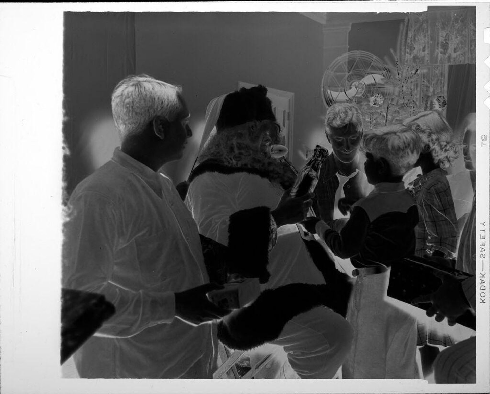 Untitled (Santa giving gifts to children) by Robert Burian