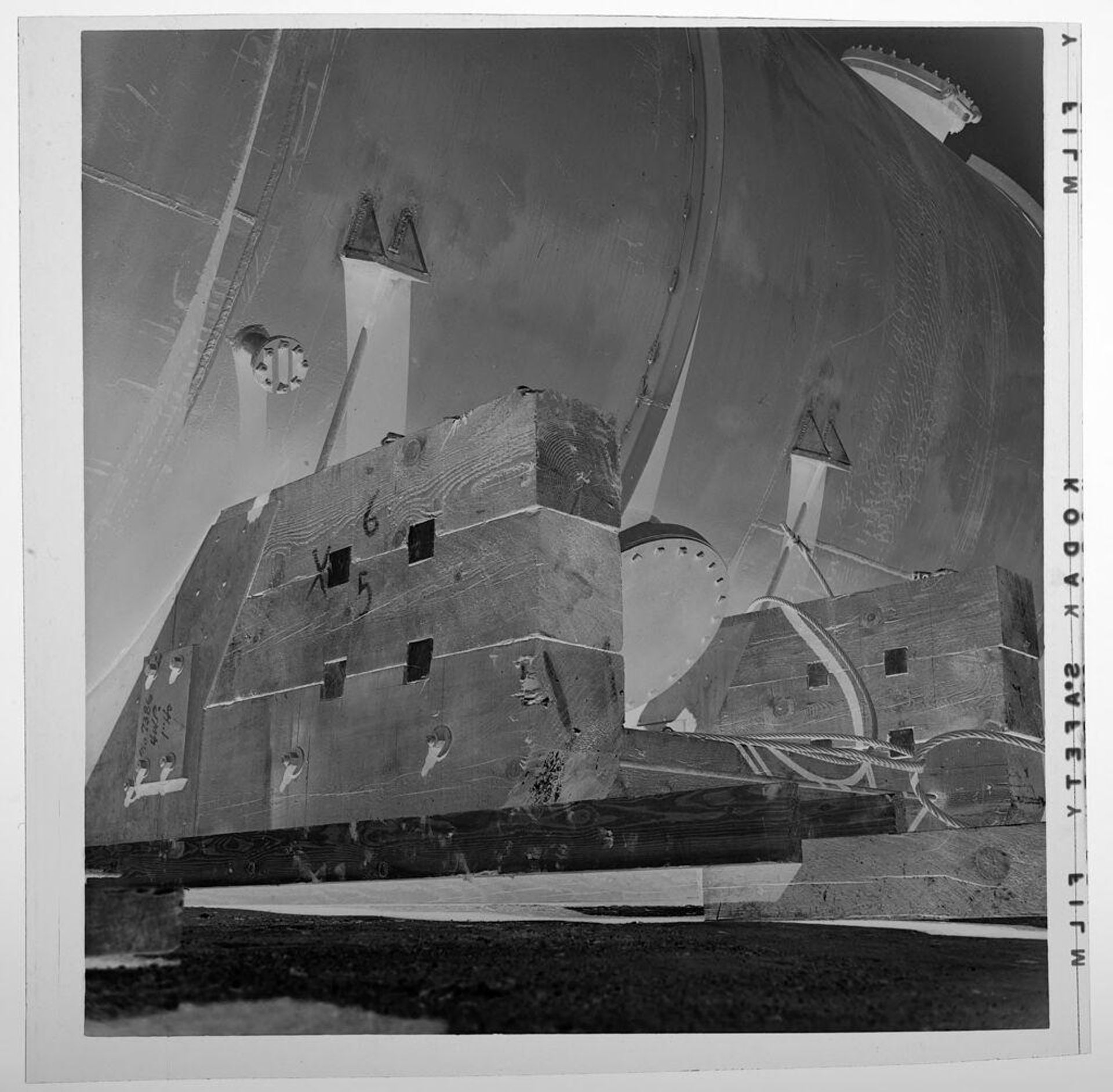 Untitled (close-up view of large tank) by Jack Gould