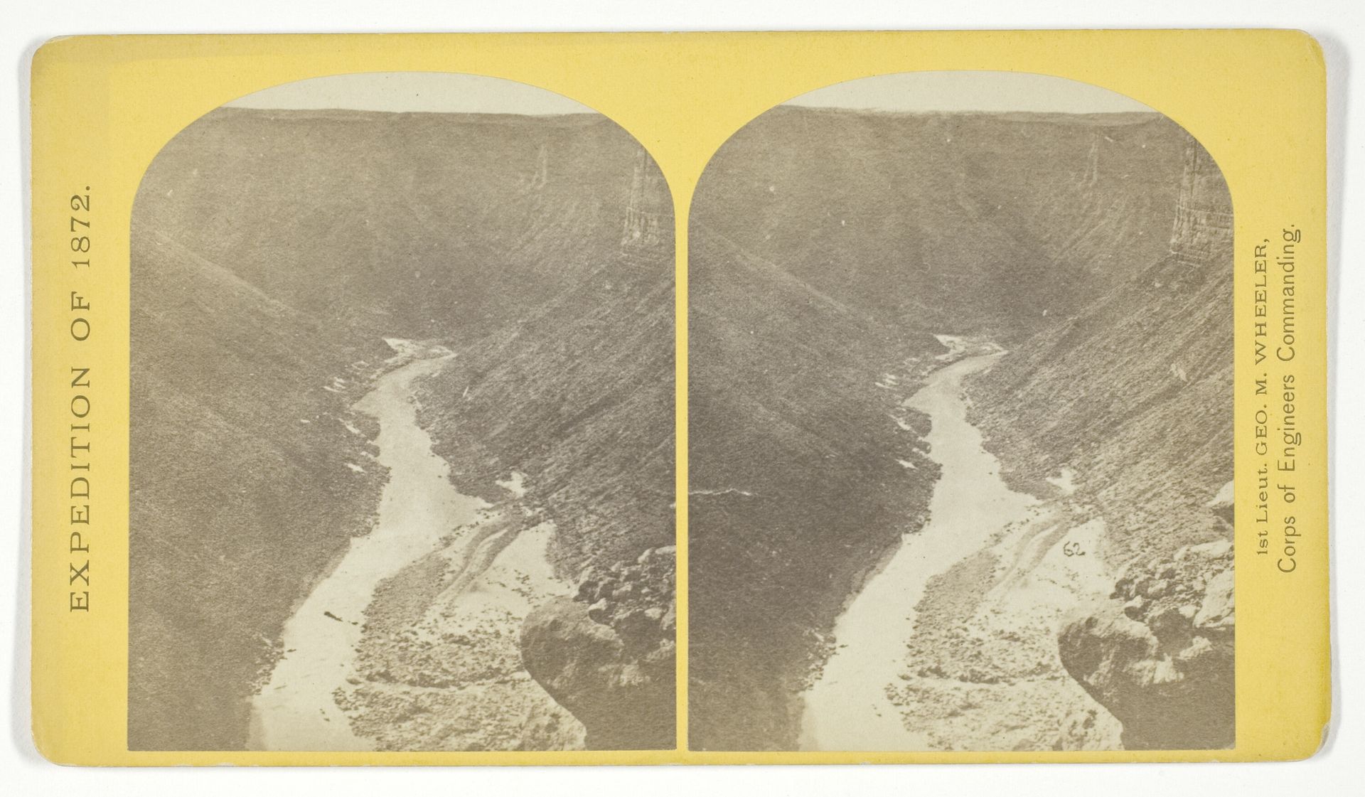 Marble Cañon, one of the gorges of the Colorado here, 1.200 feet deep. The steep cliff is gray limestone and the slope below a brilliant red sandstone. by William Bell