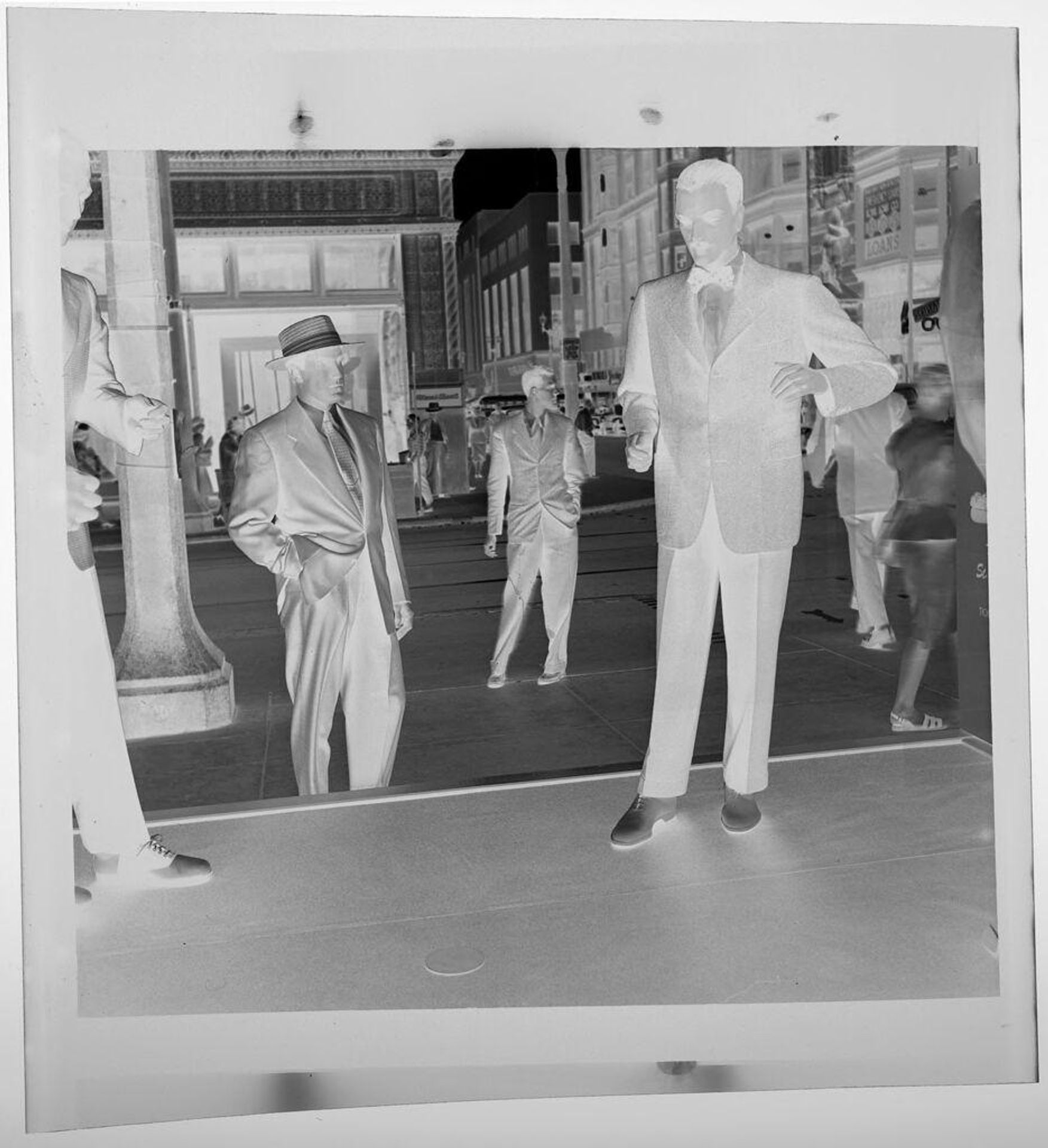 Untitled (man looking into store window at manequin) by Jack Gould
