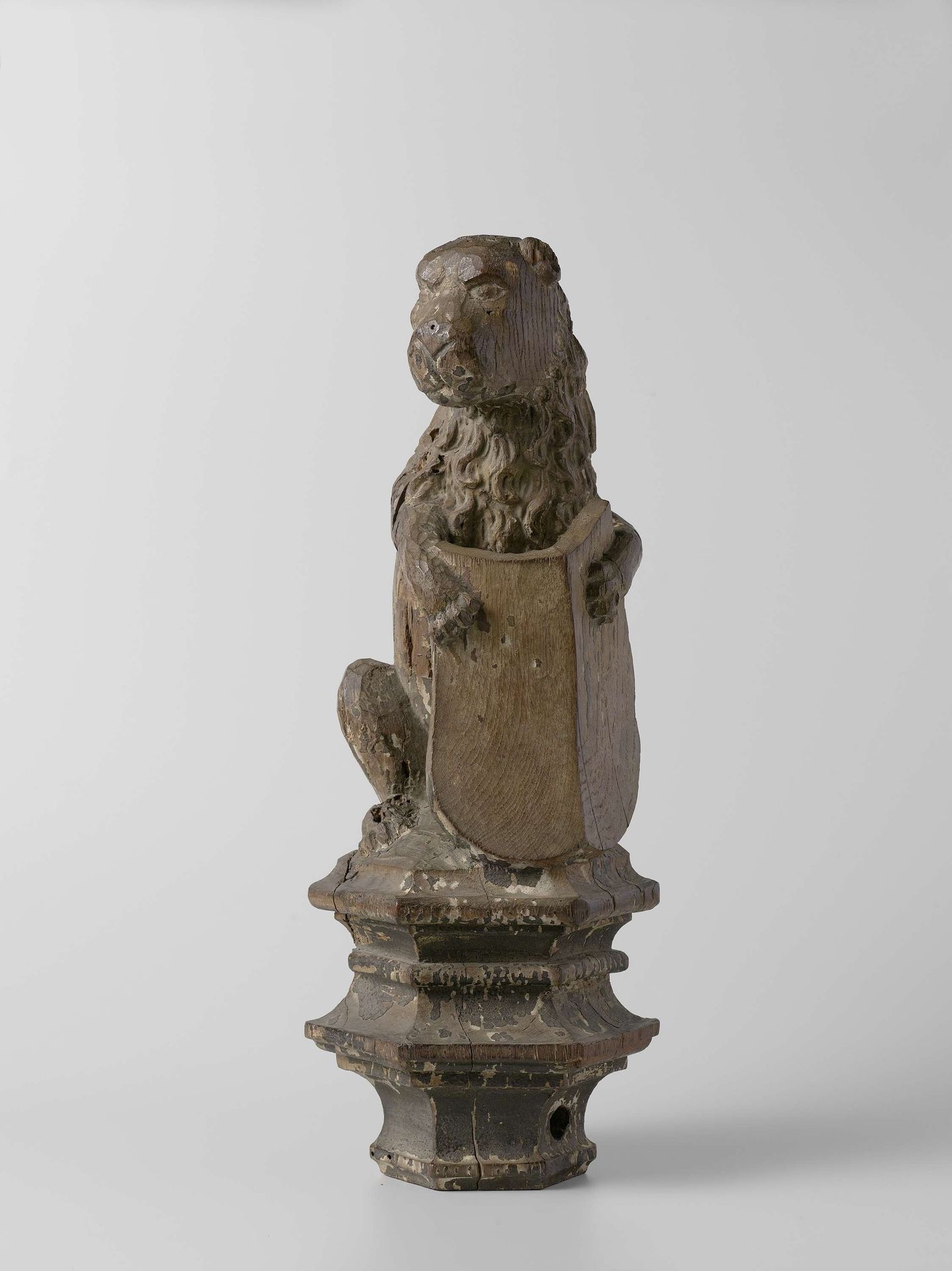 Lion Supporting an Escutcheon, from the Top of a Balustrade or the Backrest of the Stadholder’s Chair in the Rolzaal in the Hof van Holland, The Hague by Joost Janszoon
