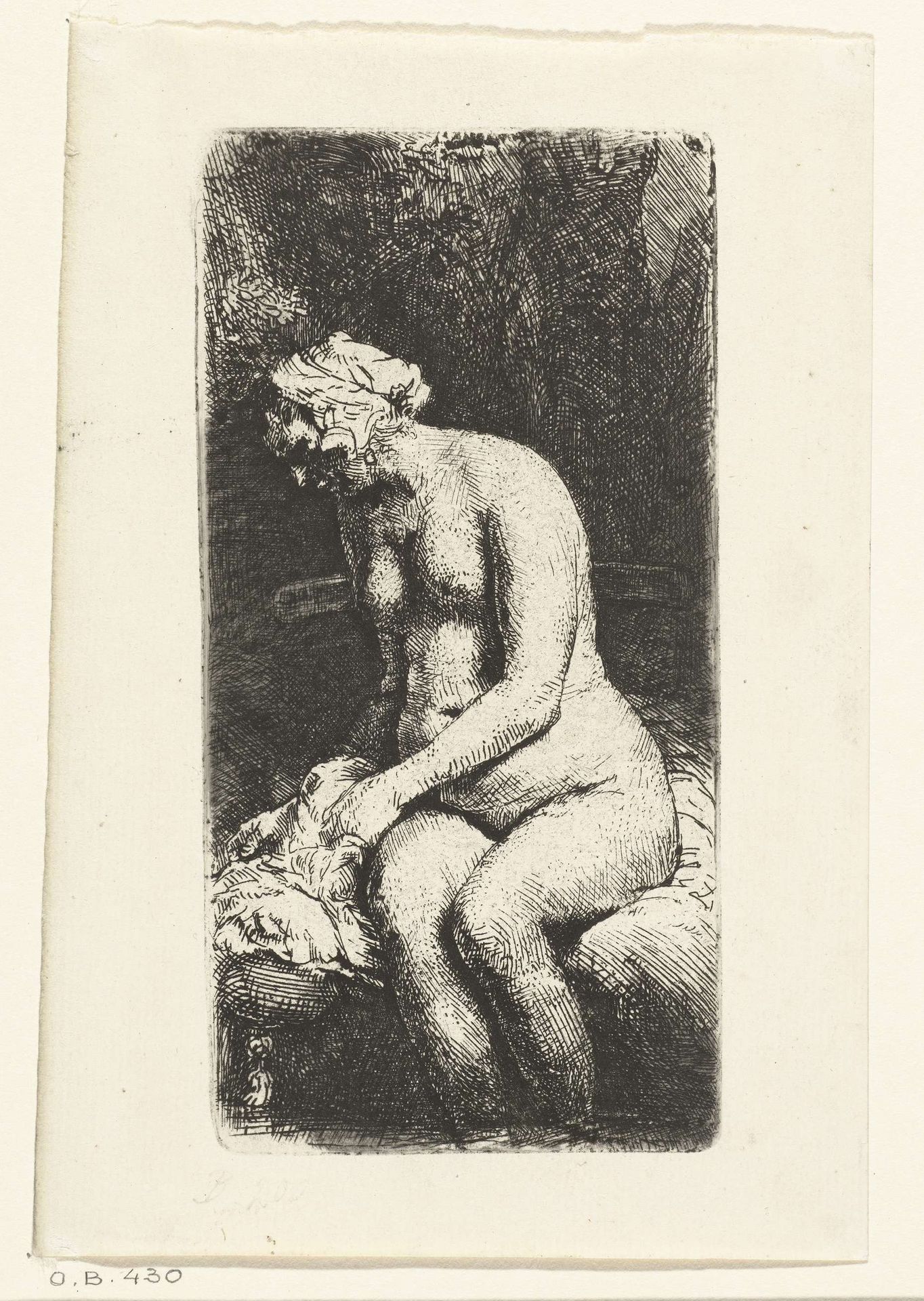 Woman bathing her feet at a brook by Rembrandt van Rijn