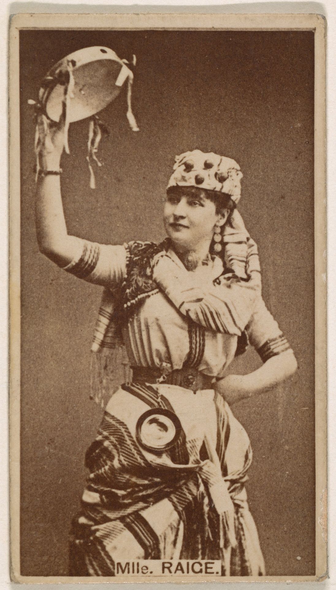 Mlle. Raige, from the Actresses series (N245) issued by Kinney Brothers to promote Sweet Caporal Cigarettes by Kinney Brothers Tobacco Company