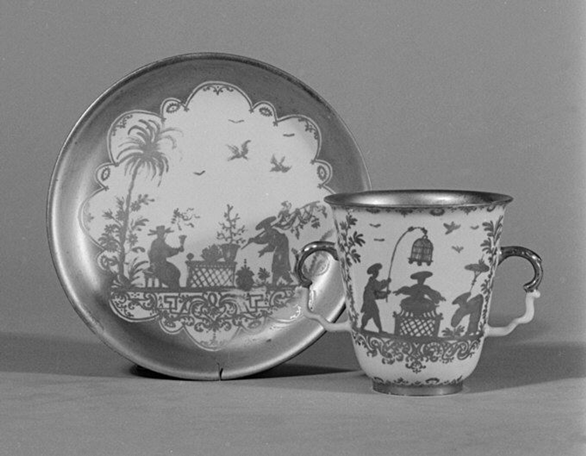 Two-handled beaker and saucer by Meissen Manufactory