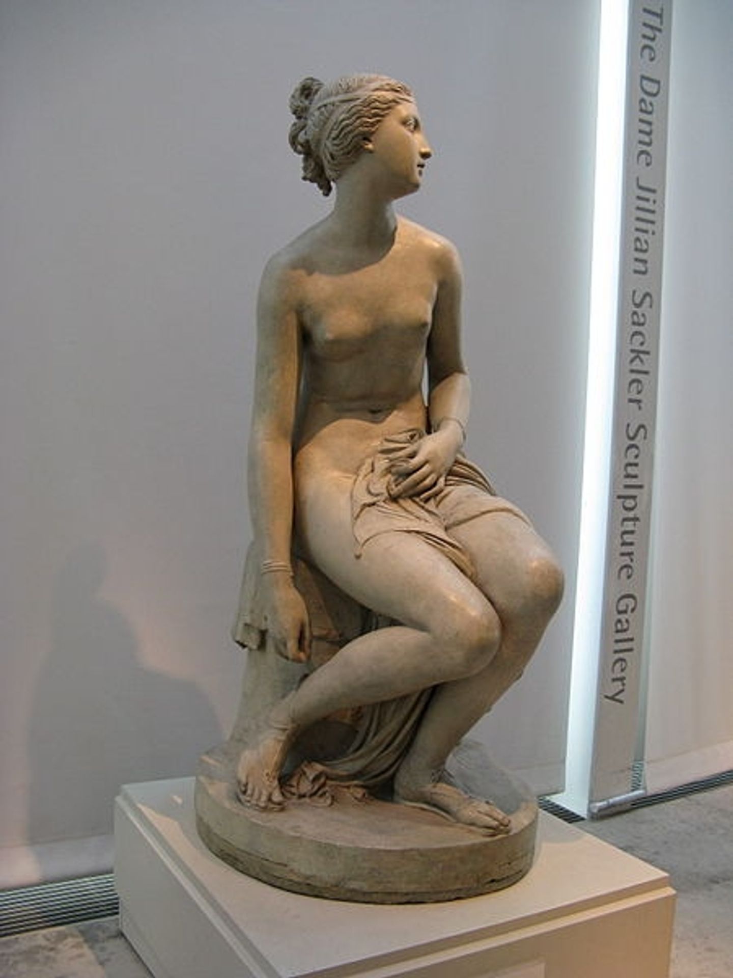 Nymph untying her sandal by John Gibson