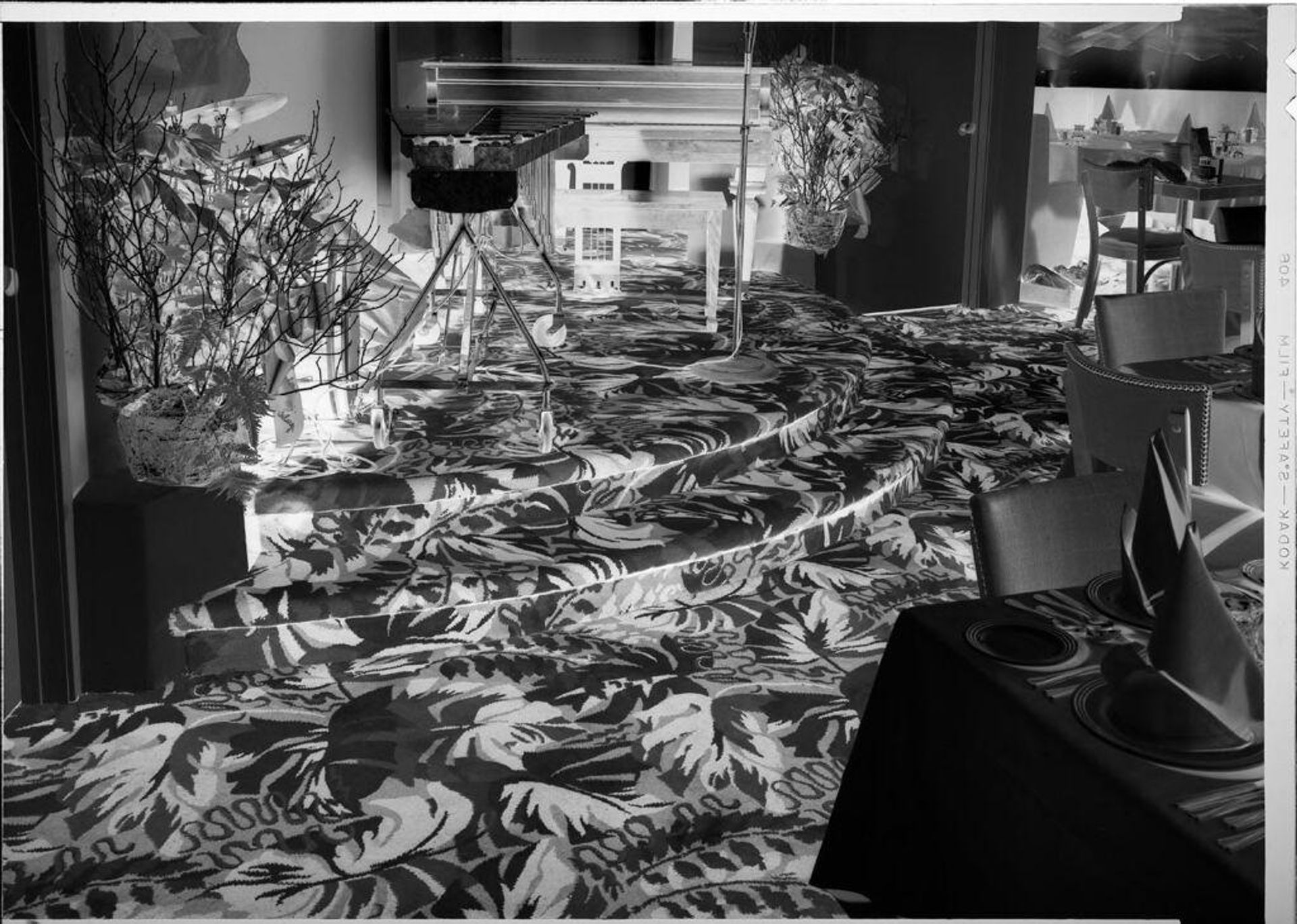 Untitled (interior of restaurant and lounge with floral carpet) by Robert Burian