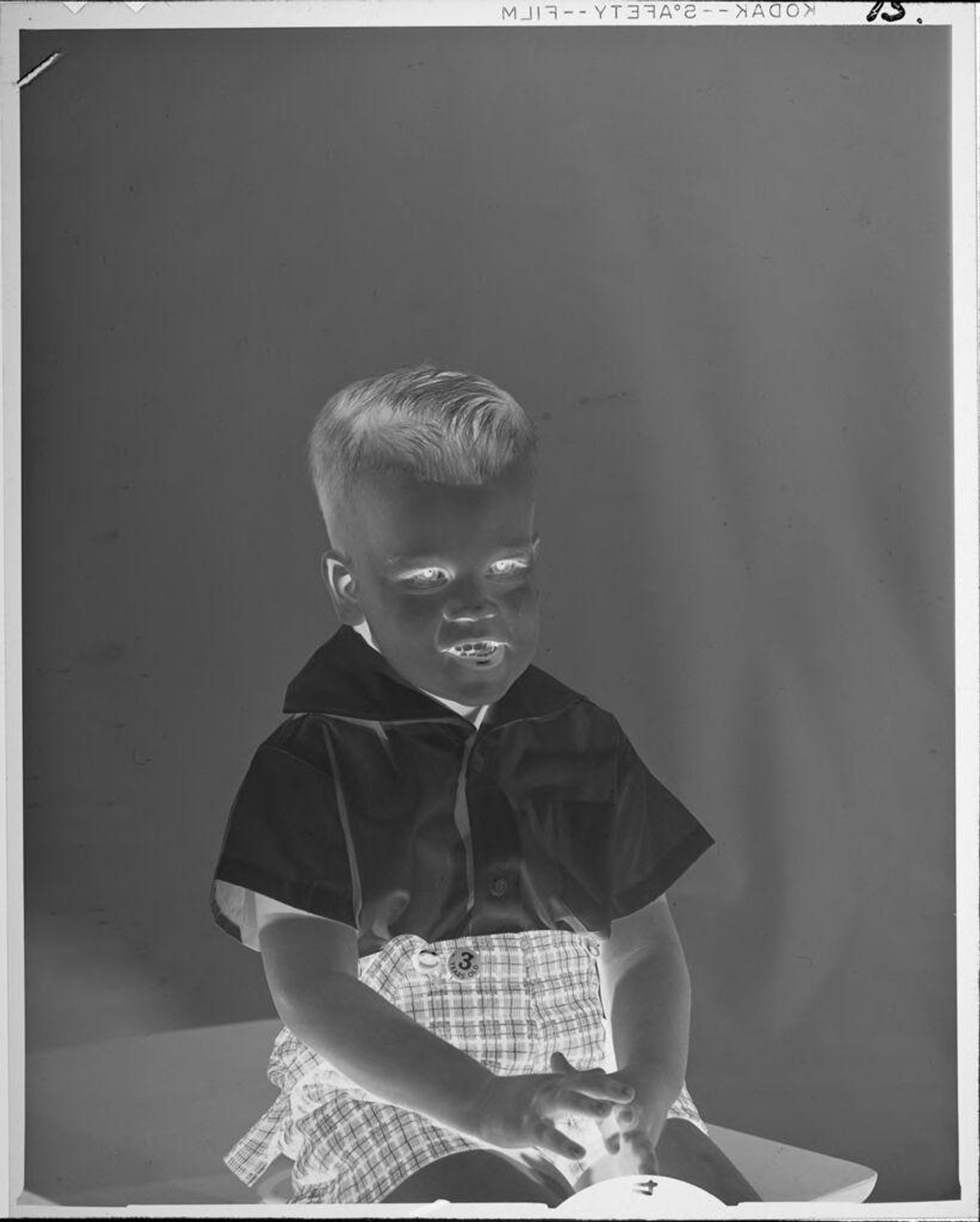 Untitled (portrait of little boy) by Lucian and Mary Brown