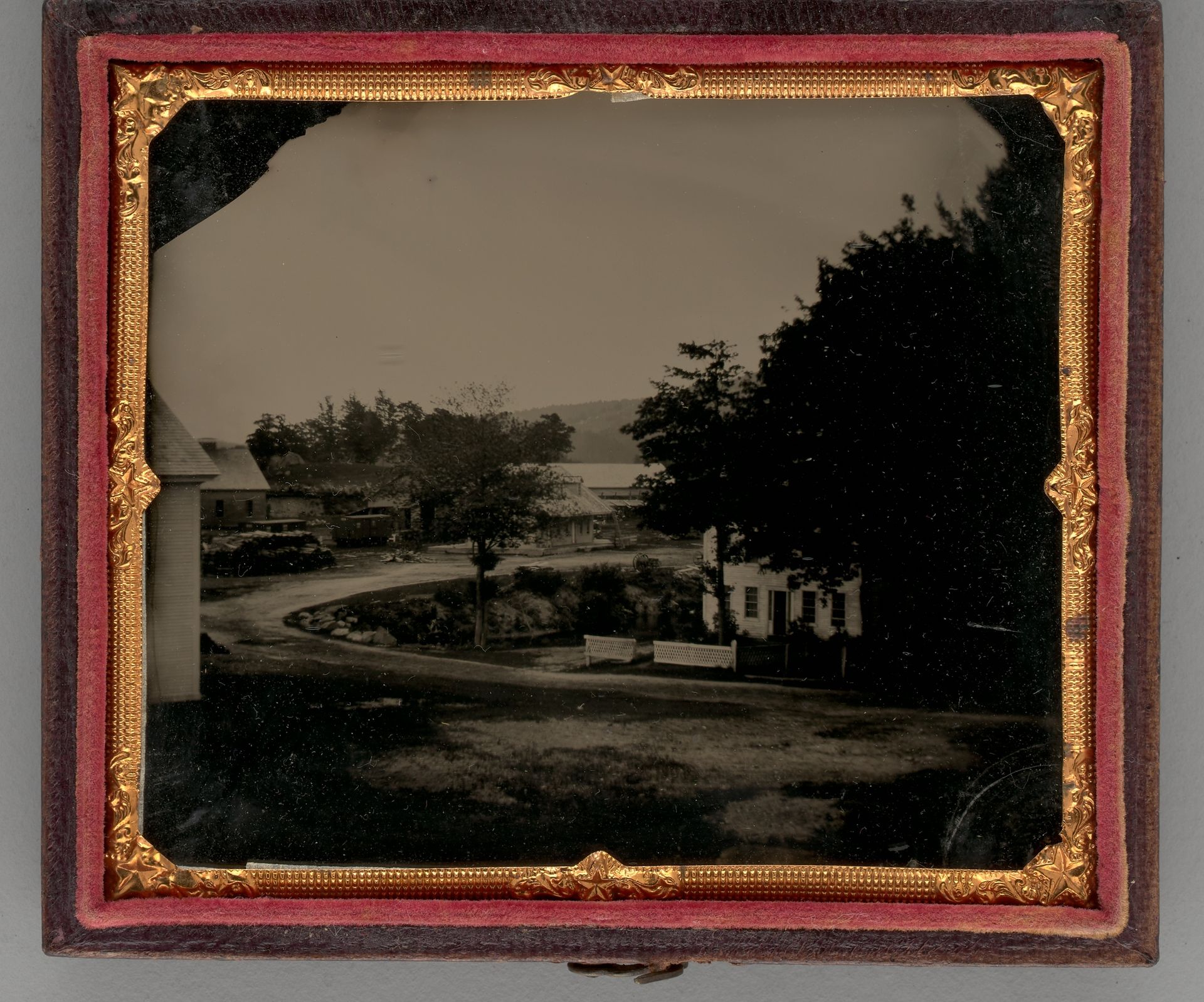 Untitled (Curved Road with Several Houses) by Anonymous