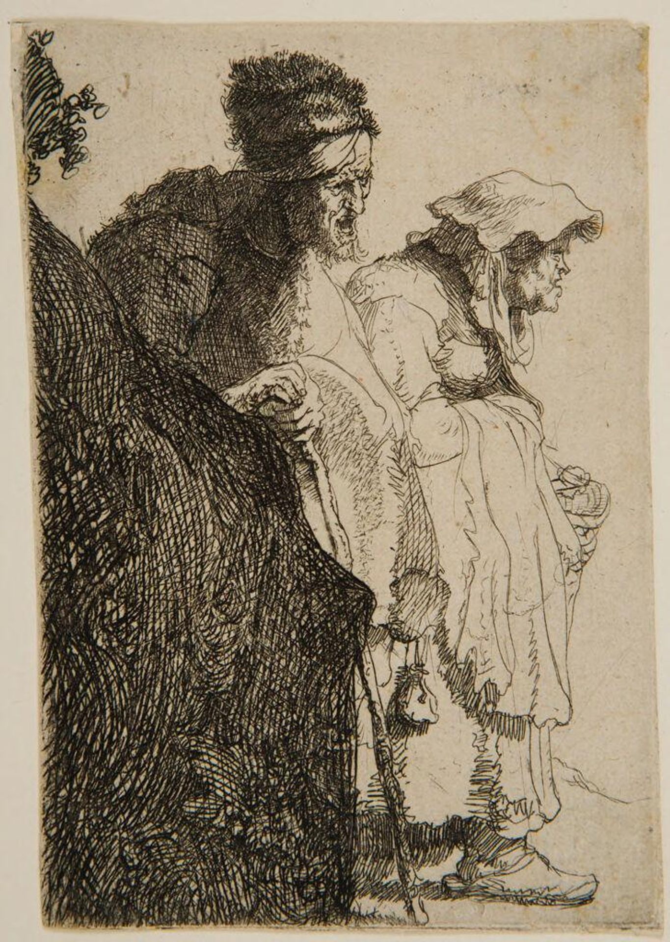 Beggar Man and Woman behind a Bank by Rembrandt van Rijn