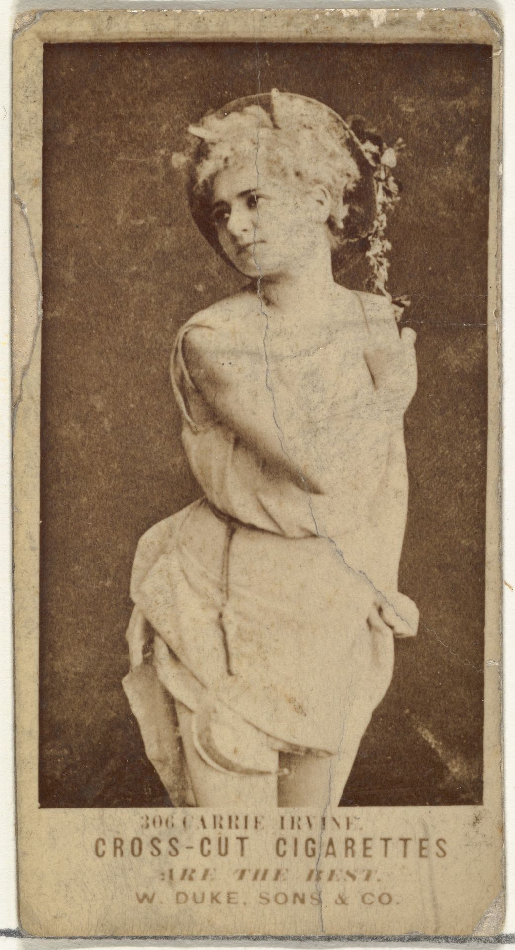 Card Number 306, Carrie Irvine, from the Actors and Actresses series (N145-3) issued by Duke Sons & Co. to promote Cross Cut Cigarettes by W. Duke, Sons & Co.