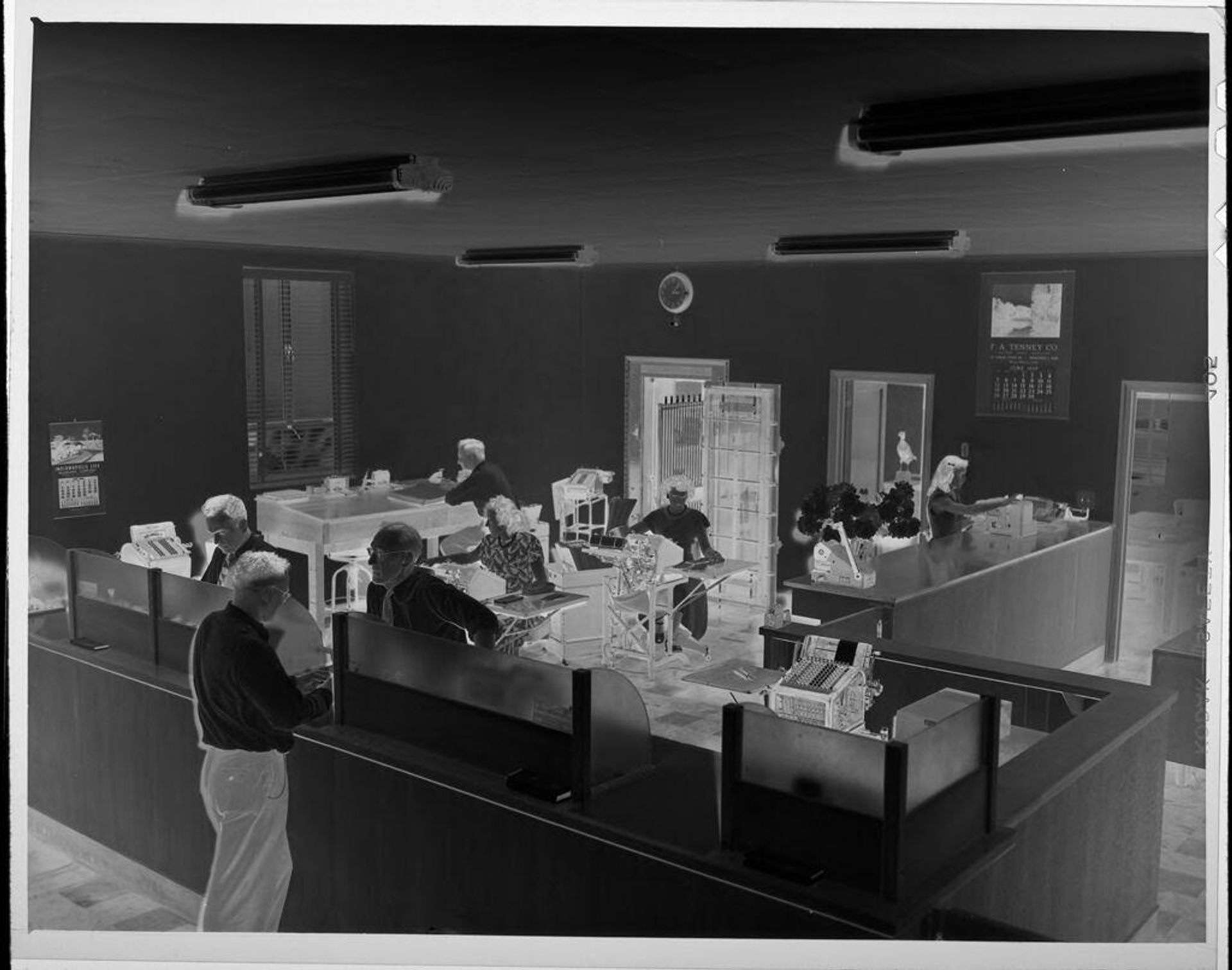 Untitled (men and women in office) by Lucian and Mary Brown