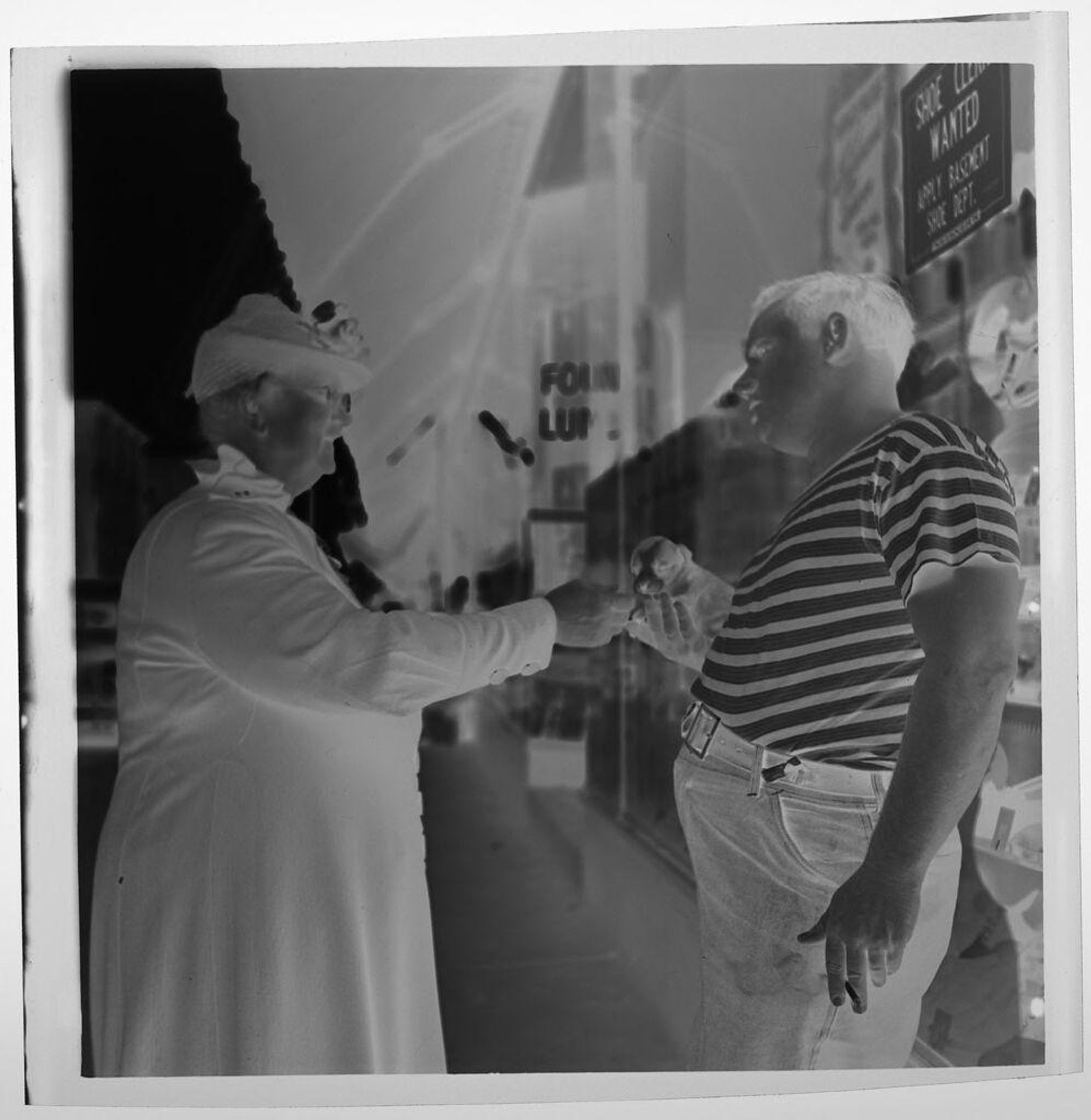 Untitled (man with tiny dog and woman at outdoor market) by Jack Gould
