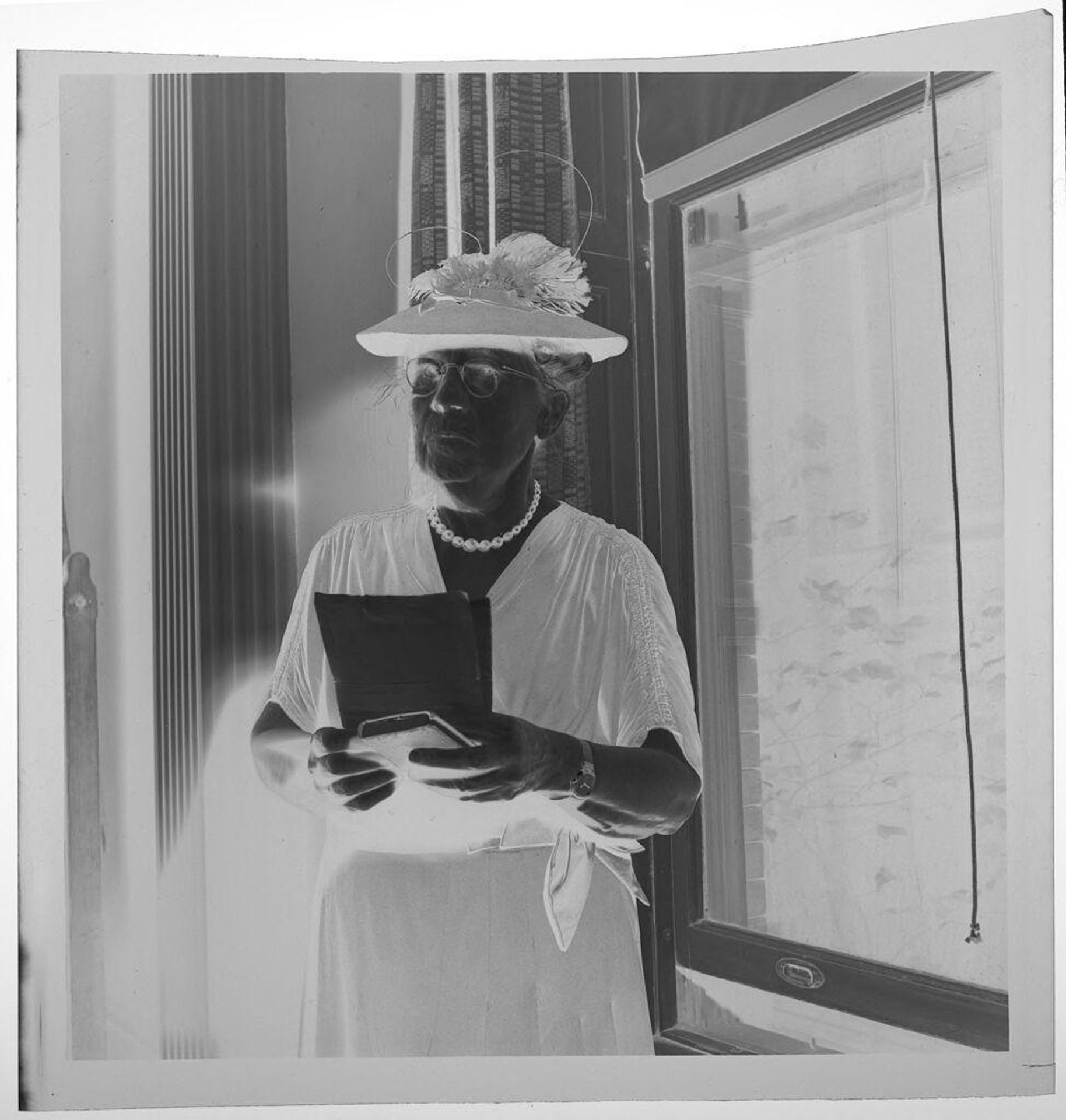 Untitled (elderly woman wearing a hat) by Jack Gould