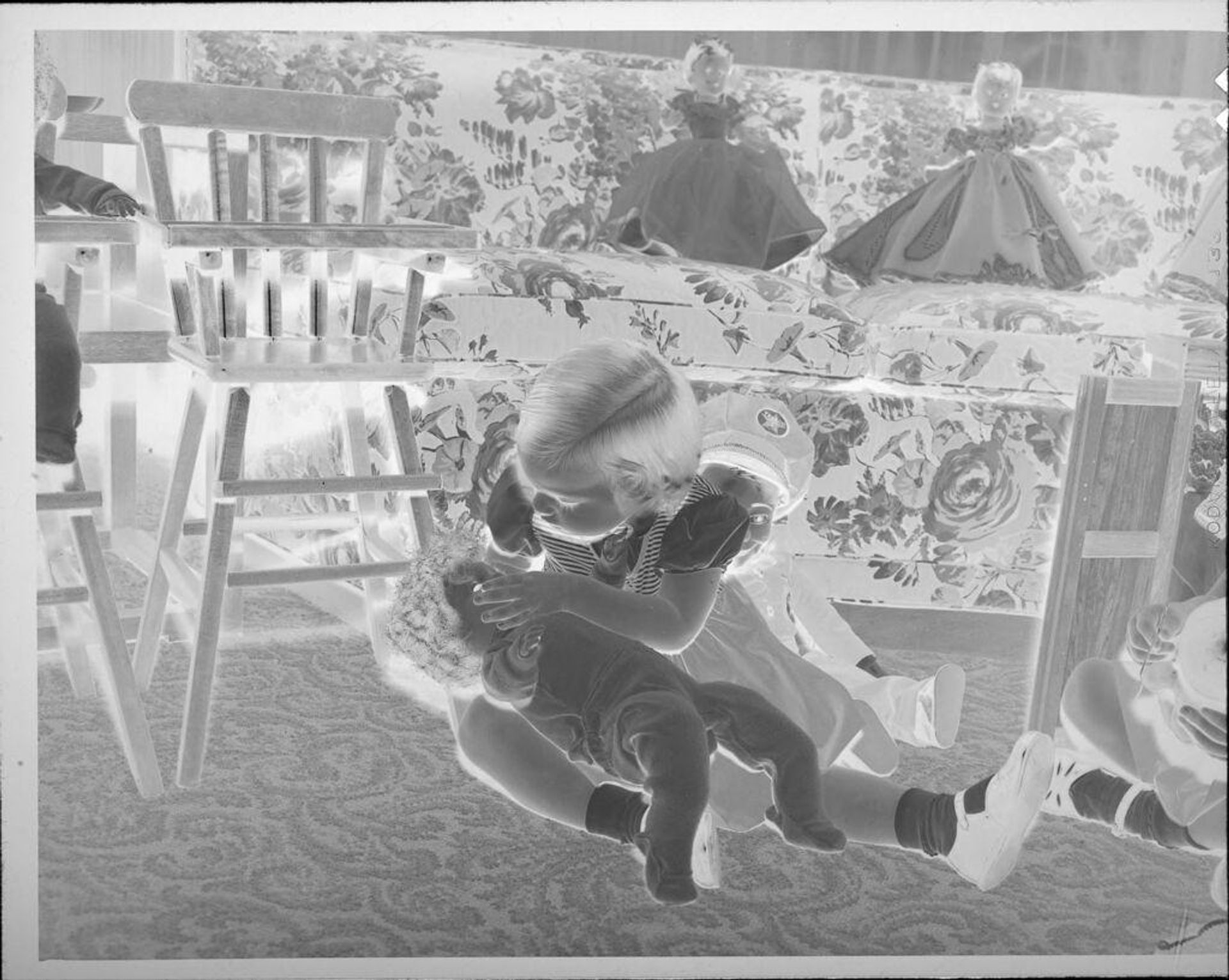 Untitled (girl with dolls) by Lucian and Mary Brown
