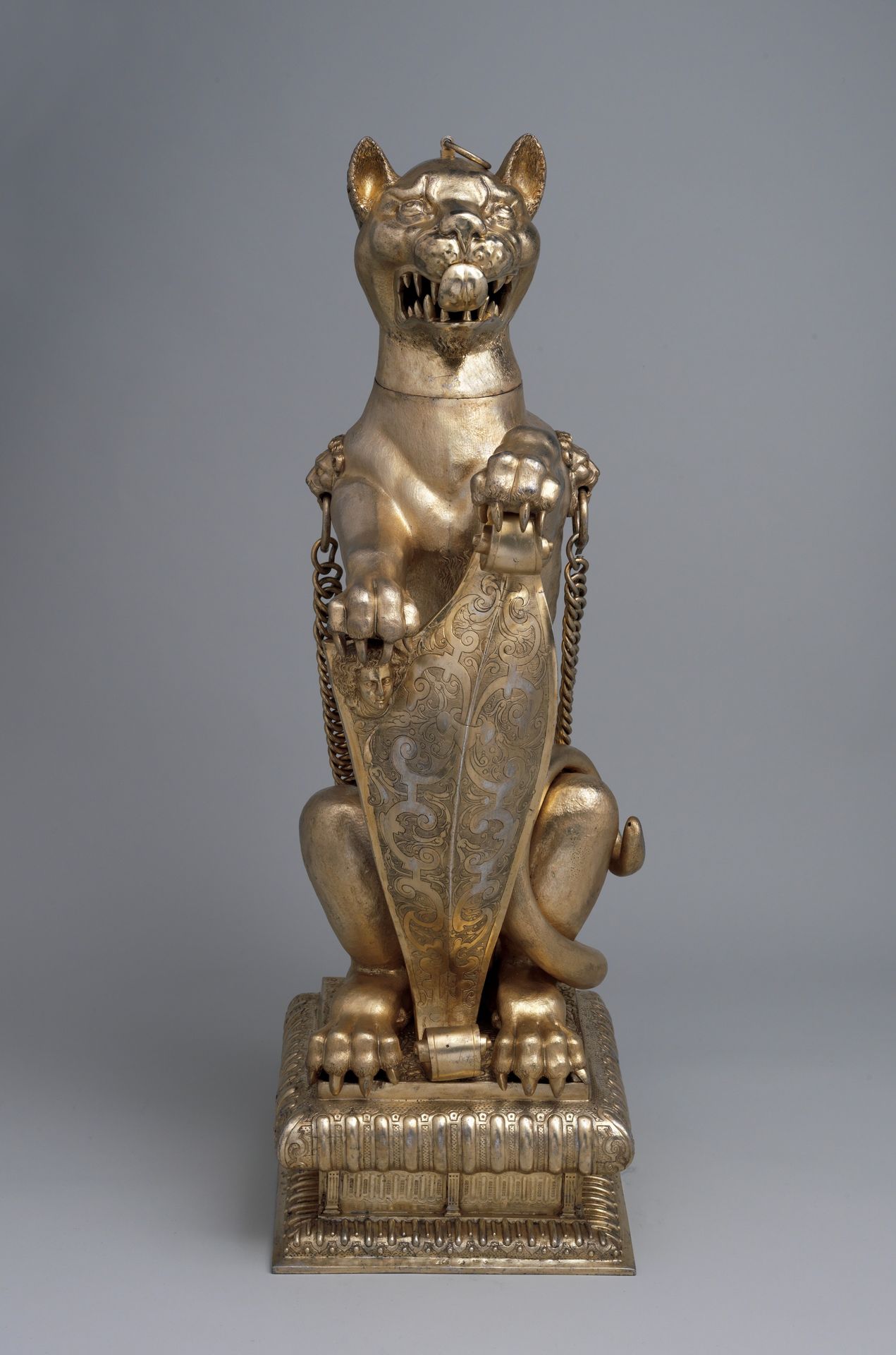 Leopard holding a shield by Elkington & Co.
