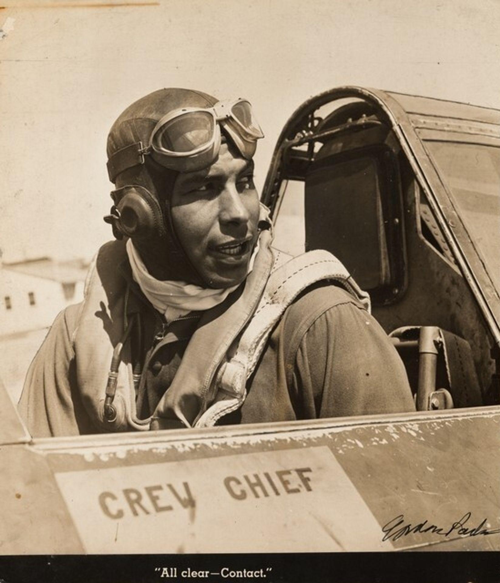 Lt. "Wild Bill" William Walker, former college athlete, in the cockpit of a P39, Selfridge Field, Michigan ("All clear—Contact.") by Gordon Parks