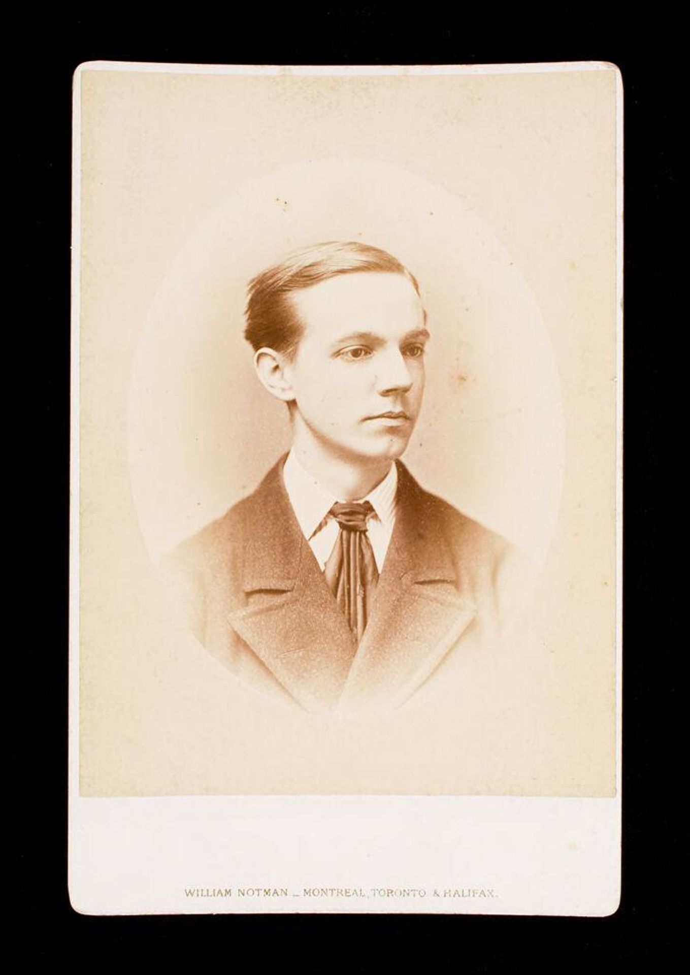 Untitled (bust length portrait of clean shaven man labeled George R. R. Rivers, A.B. 1875) by William Notman