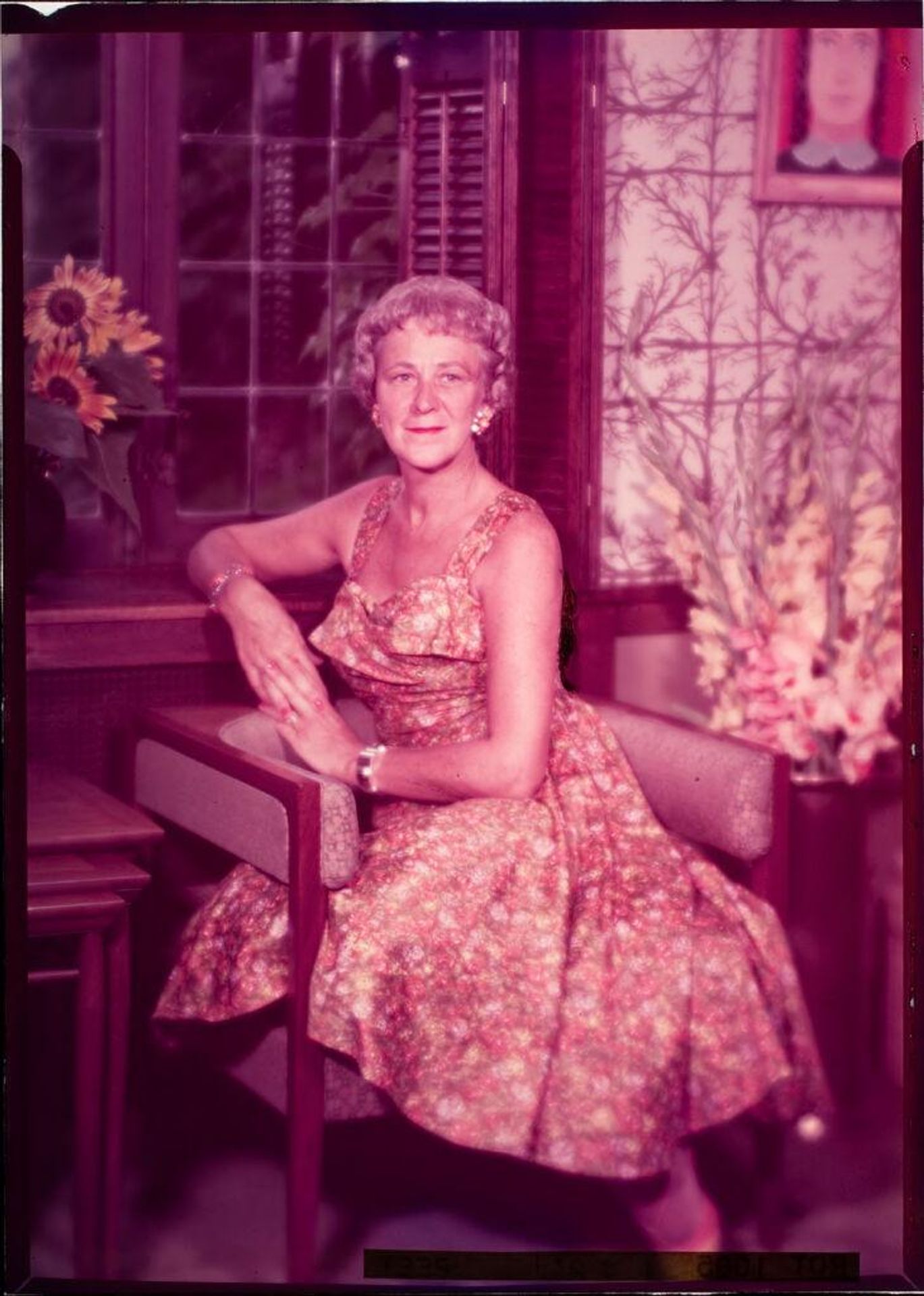 Untitled (portrait of woman sitting on chair) by C. Bennette Moore