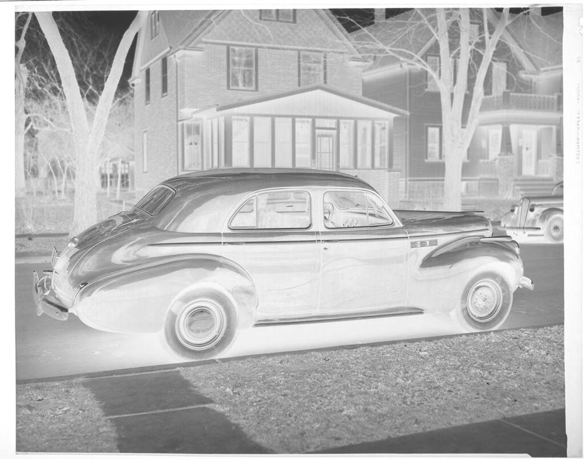 Untitled (car in driveway) by John Deusing