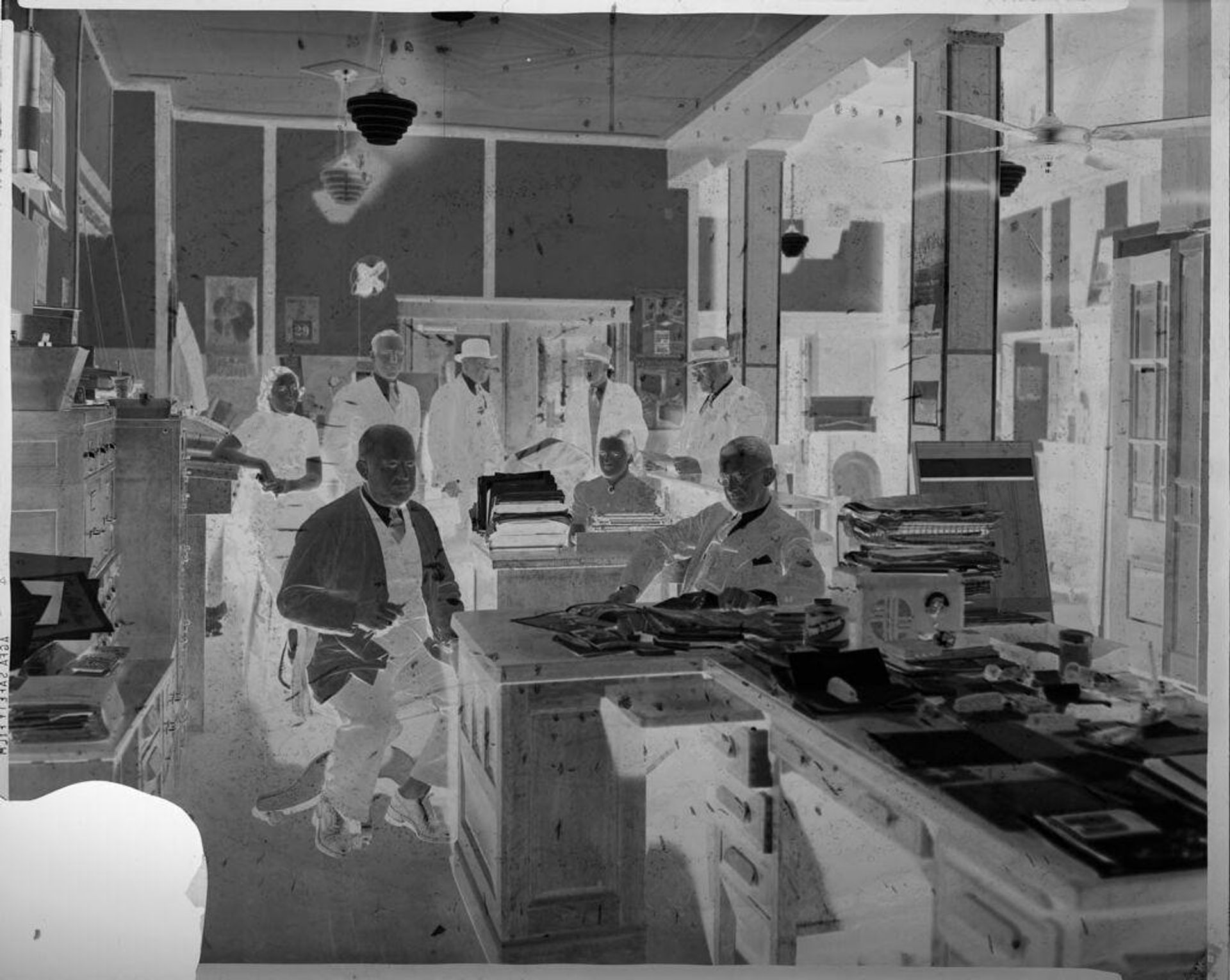 Untitled (men and women in office) by Hamblin Studio