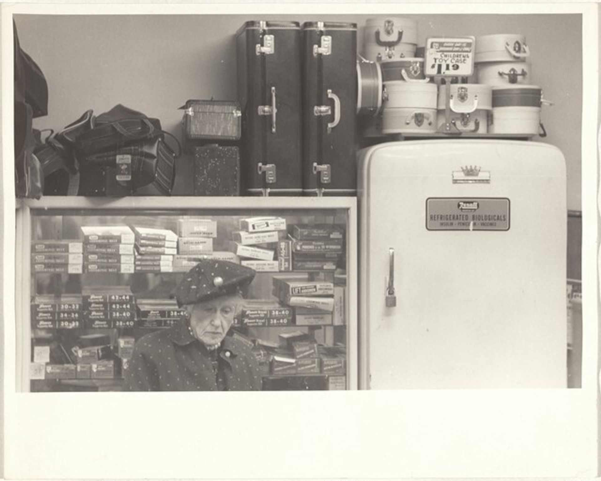 Woman in Rexall Drug store--Los Angeles by Robert Frank