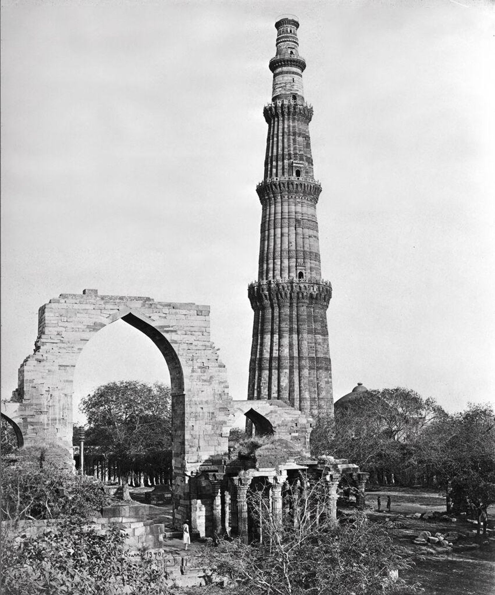 Delhi, the Qutab Minar with the Great Arch from the West by Samuel Bourne