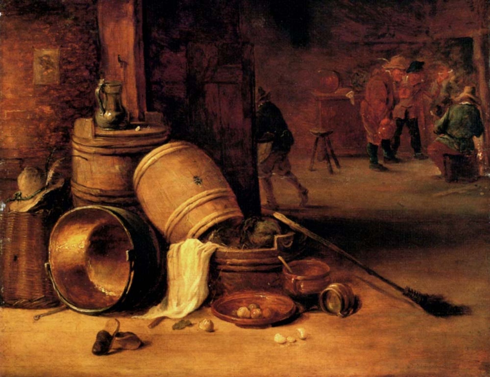 An interior scene with pots, barrels, baskets, onions and cabbages with boors carousing in the background by David Teniers The Younger