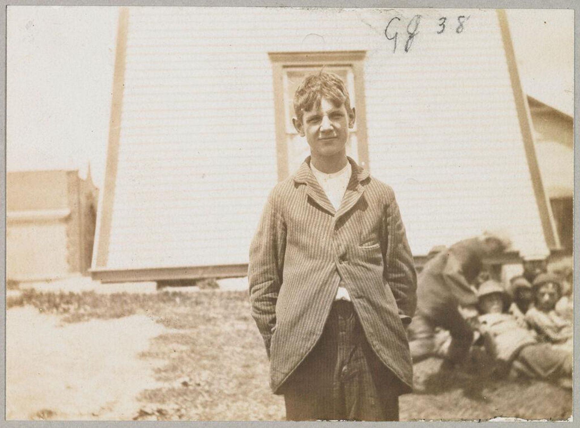 Crime, Children, Reform Schools: United States. New York. Freeville. George Junior Republic: George Junior Republic, Freeville, N.Y.: A group of Republic boys who took the contract for husking corn. by attributed to Simon Lubin