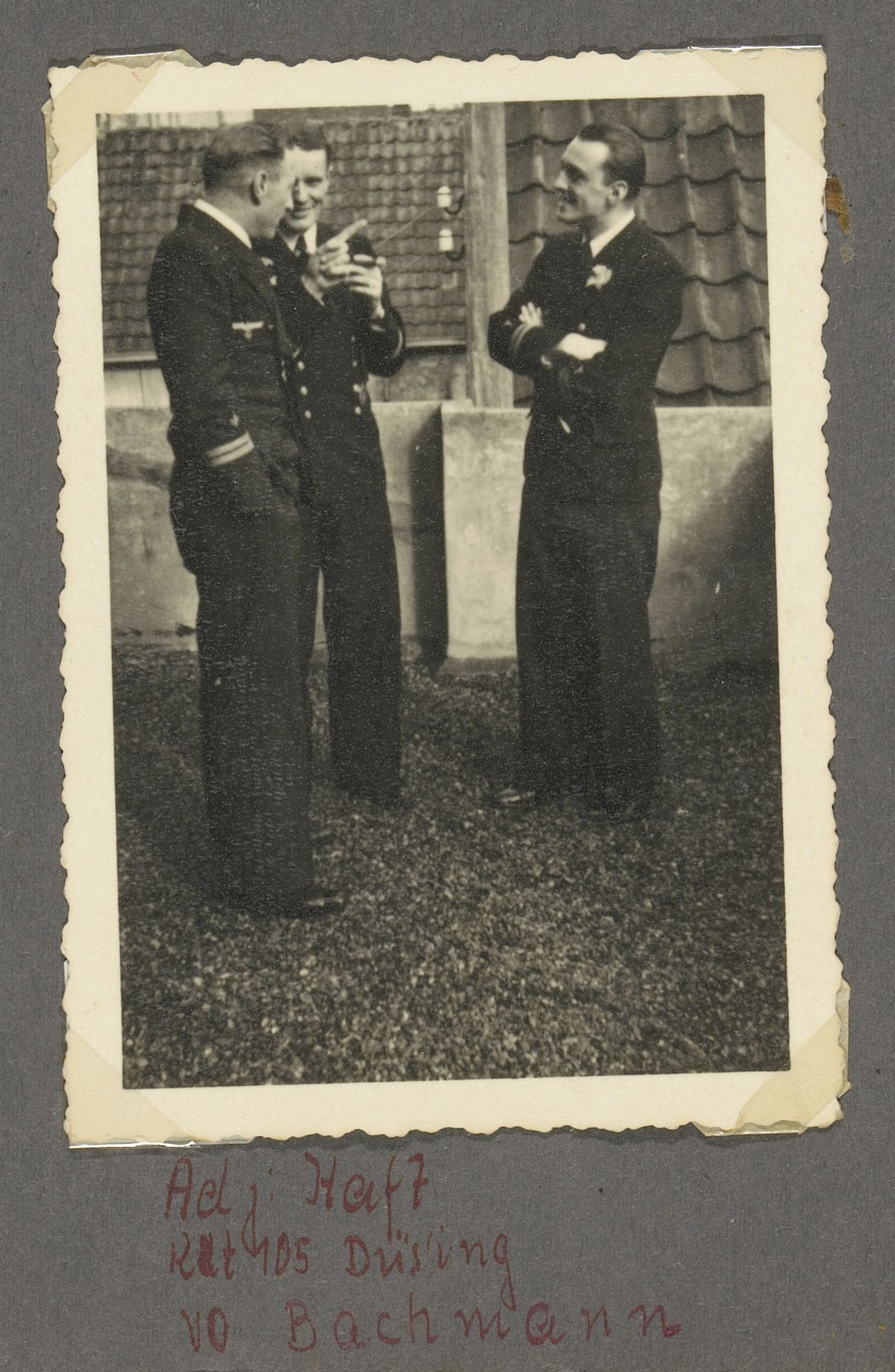 Haft, Düsing en Bachmann in uniform op een terras by Anonymous