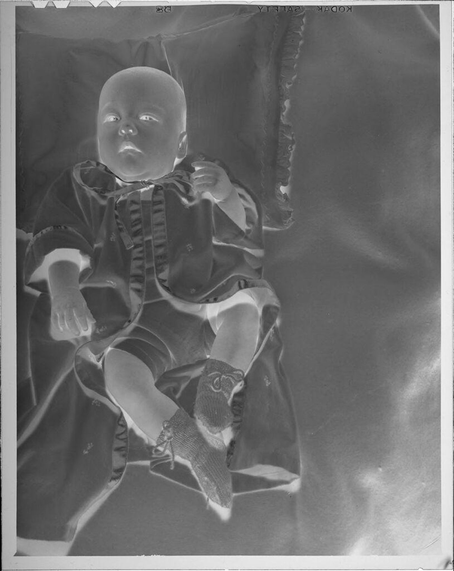 Untitled (baby on blanket) by Lucian and Mary Brown