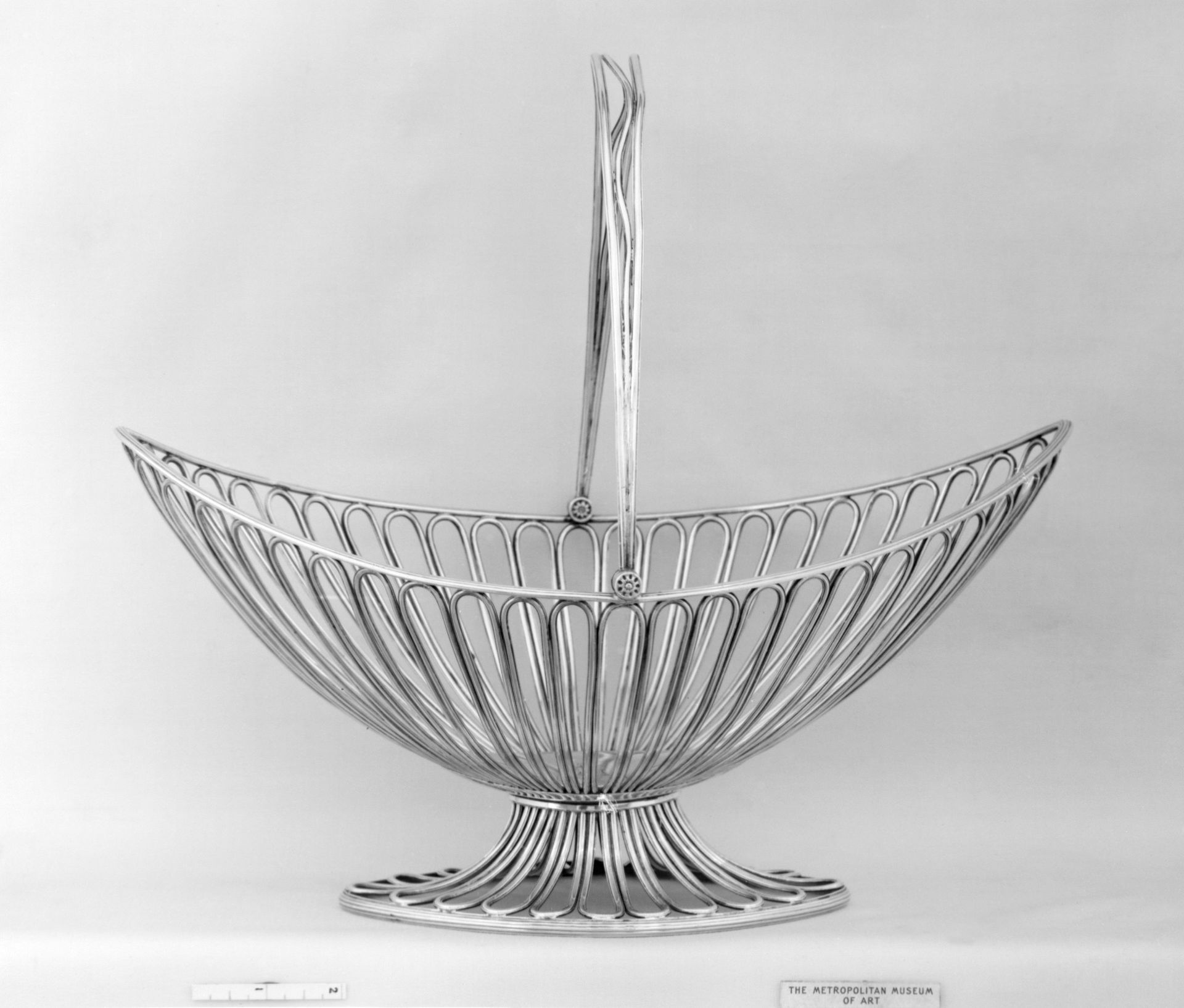 Cake basket by Samuel Kirkby and Co.