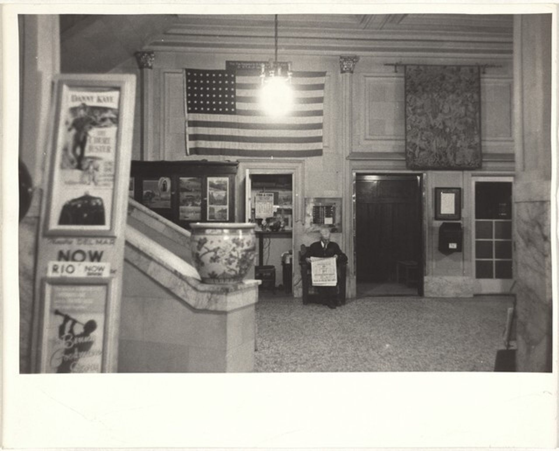 Lobby with flag--Santa Cruz, California by Robert Frank