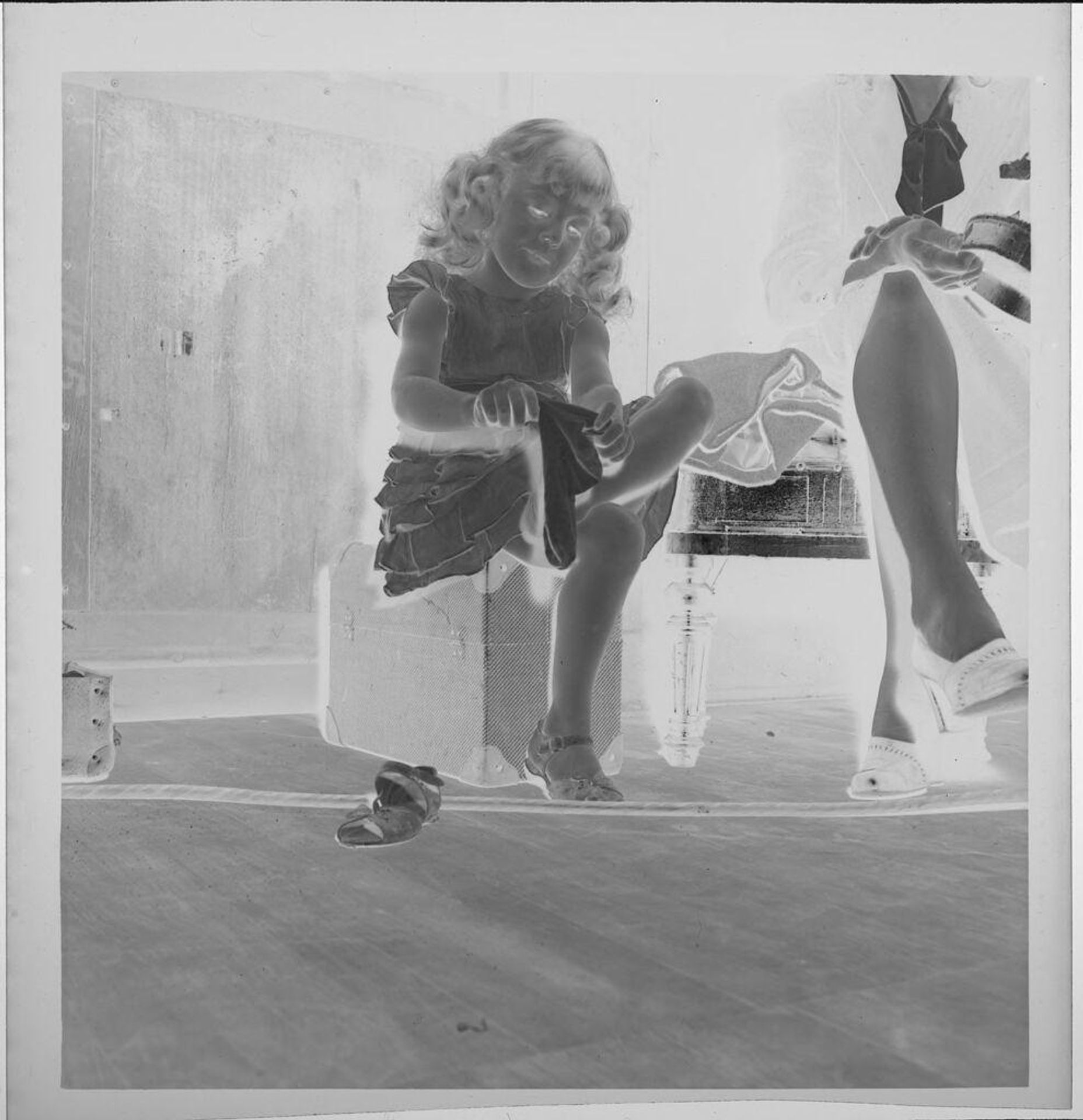 Untitled (girl getting dressed) by Jack Gould