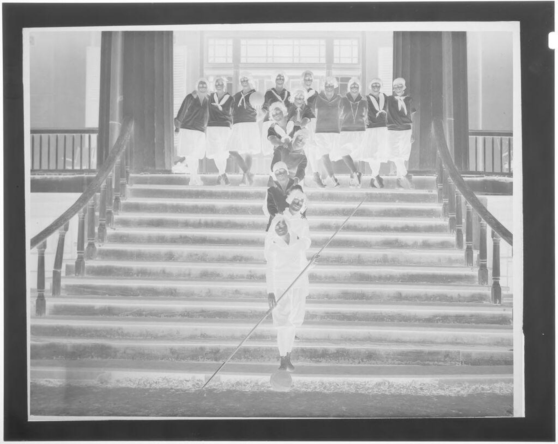 Untitled (girls basketball team posing on steps) by Hamblin Studio
