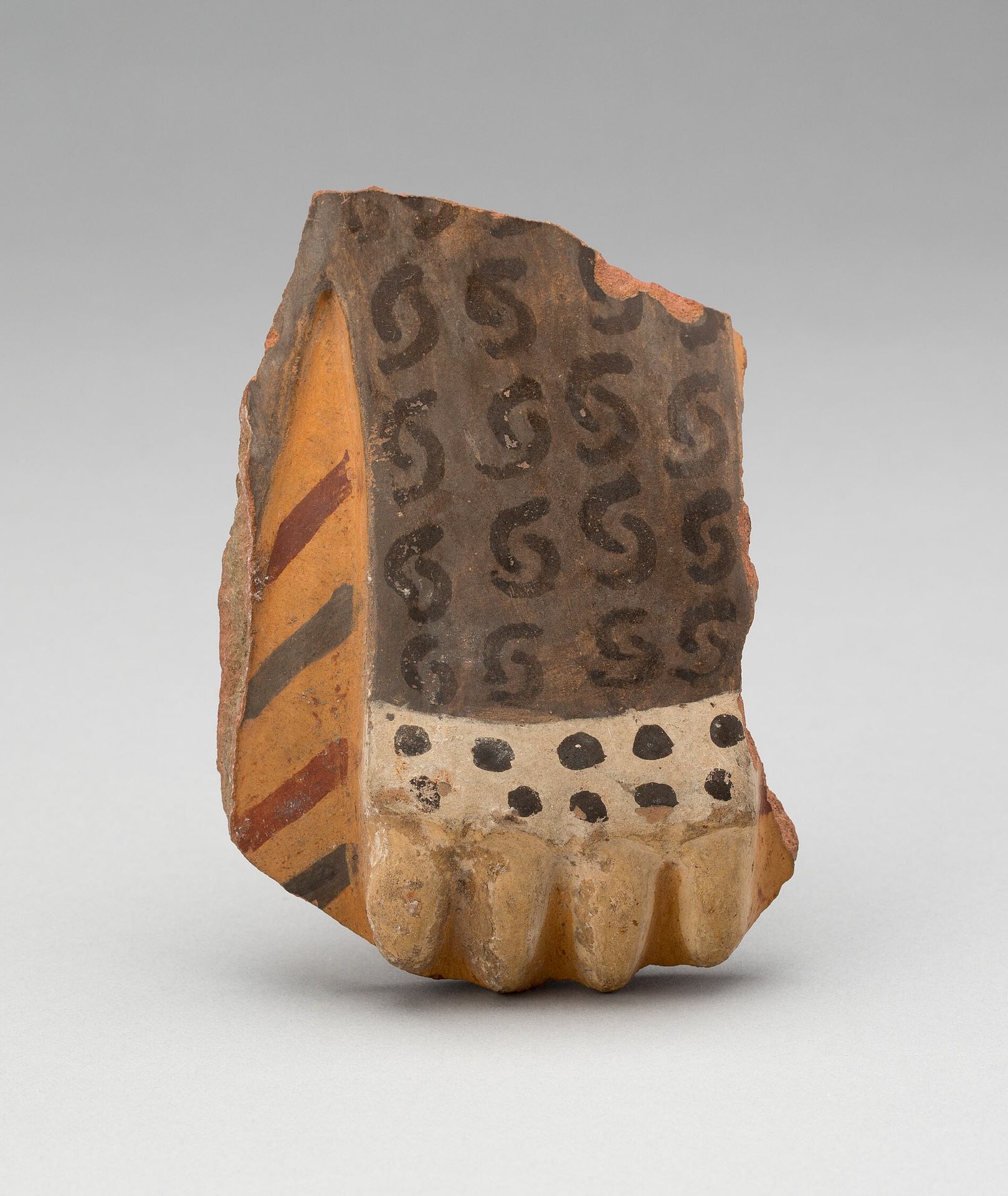 Head Fragment from a Large Ceremonial Jar by Tiwanaku