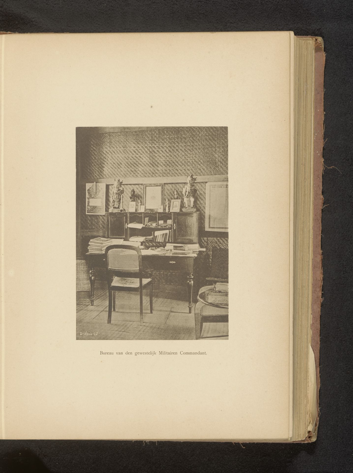 Interieur met een bureau by Christiaan Johan Neeb