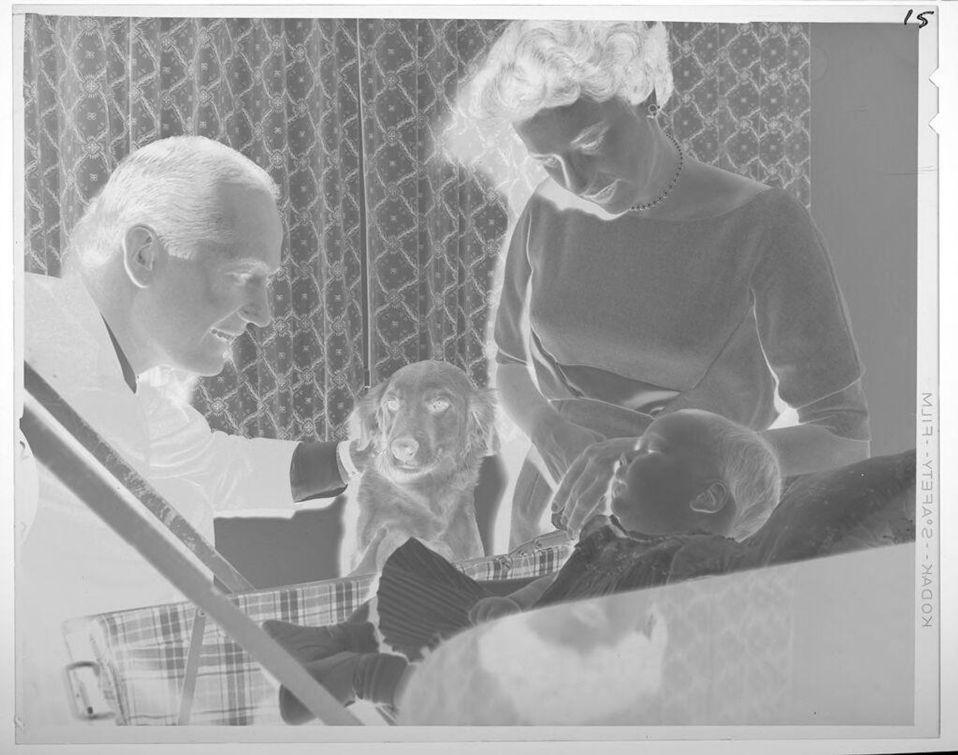 Untitled (parents, dog, and baby) by Lucian and Mary Brown