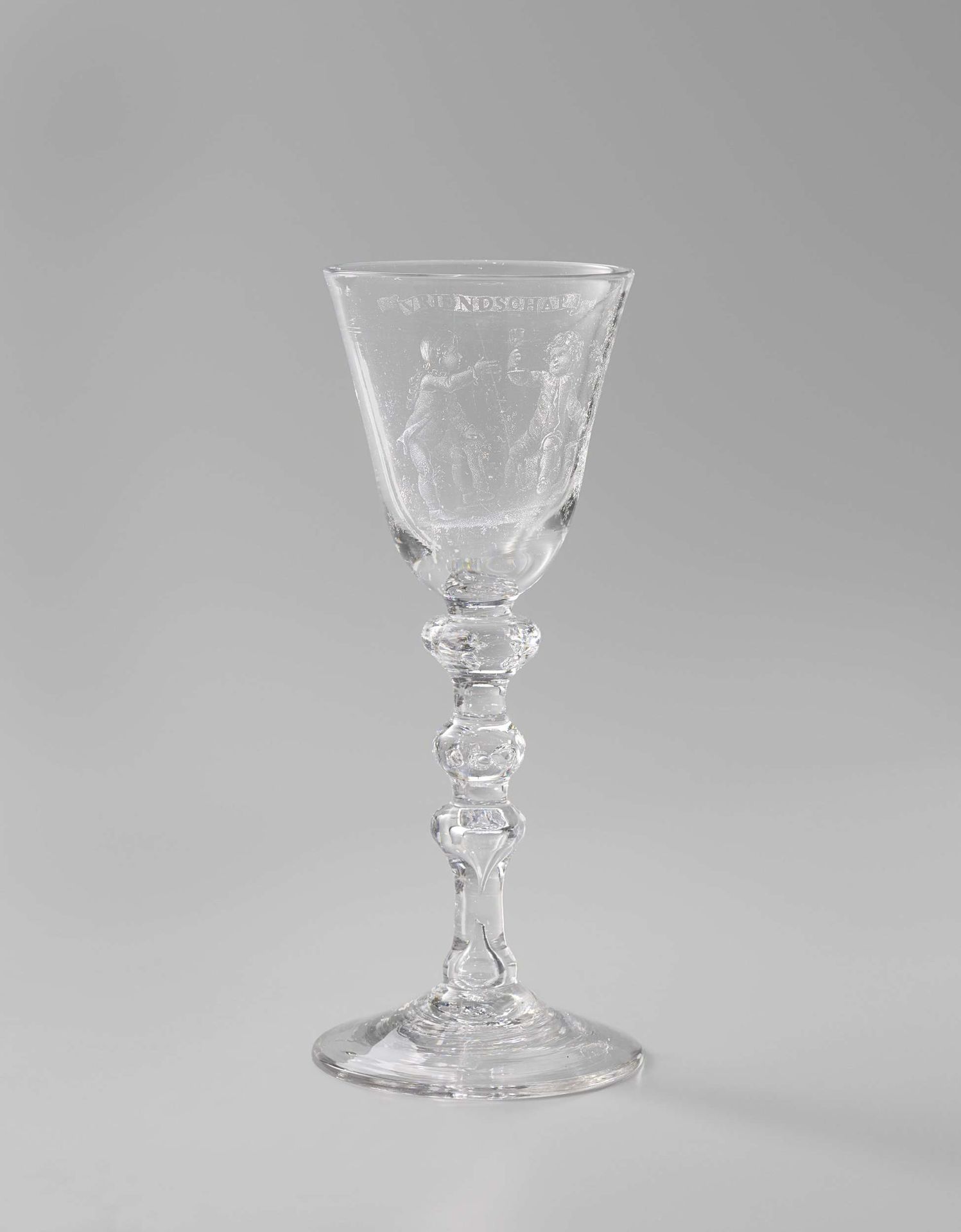 Wine glass with two little boys drinking by Anonymous
