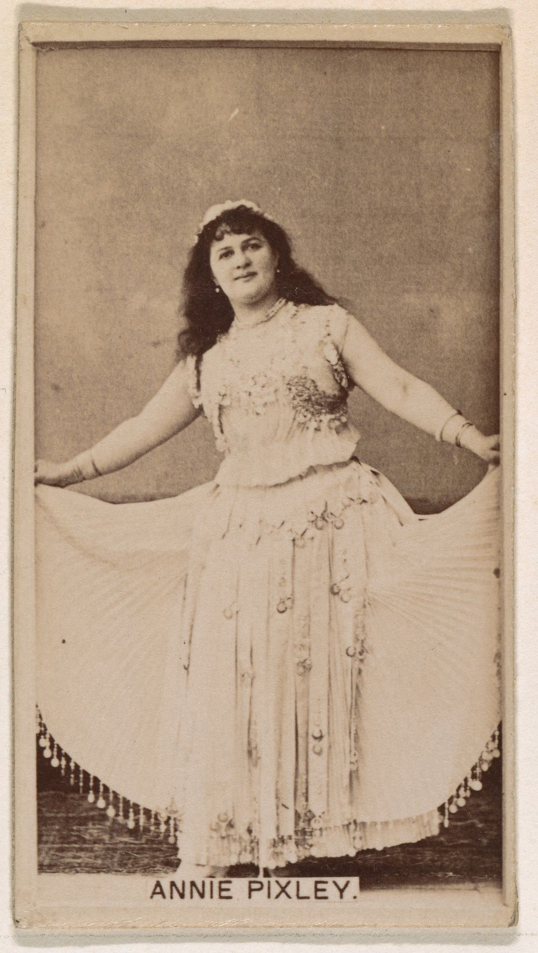 Annie Pixley, from the Actresses series (N245) issued by Kinney Brothers to promote Sweet Caporal Cigarettes by Kinney Brothers Tobacco Company