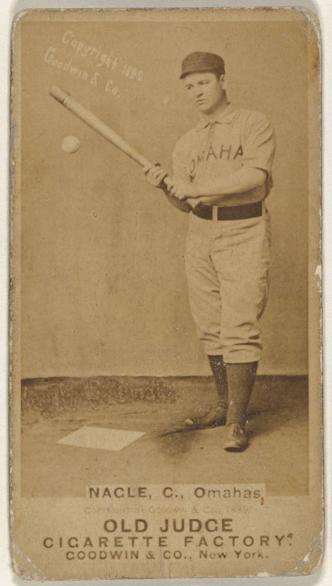 Nagle, Catcher, Omaha Omahogs/ Lambs, from the Old Judge series (N172) for Old Judge Cigarettes by Goodwin & Company