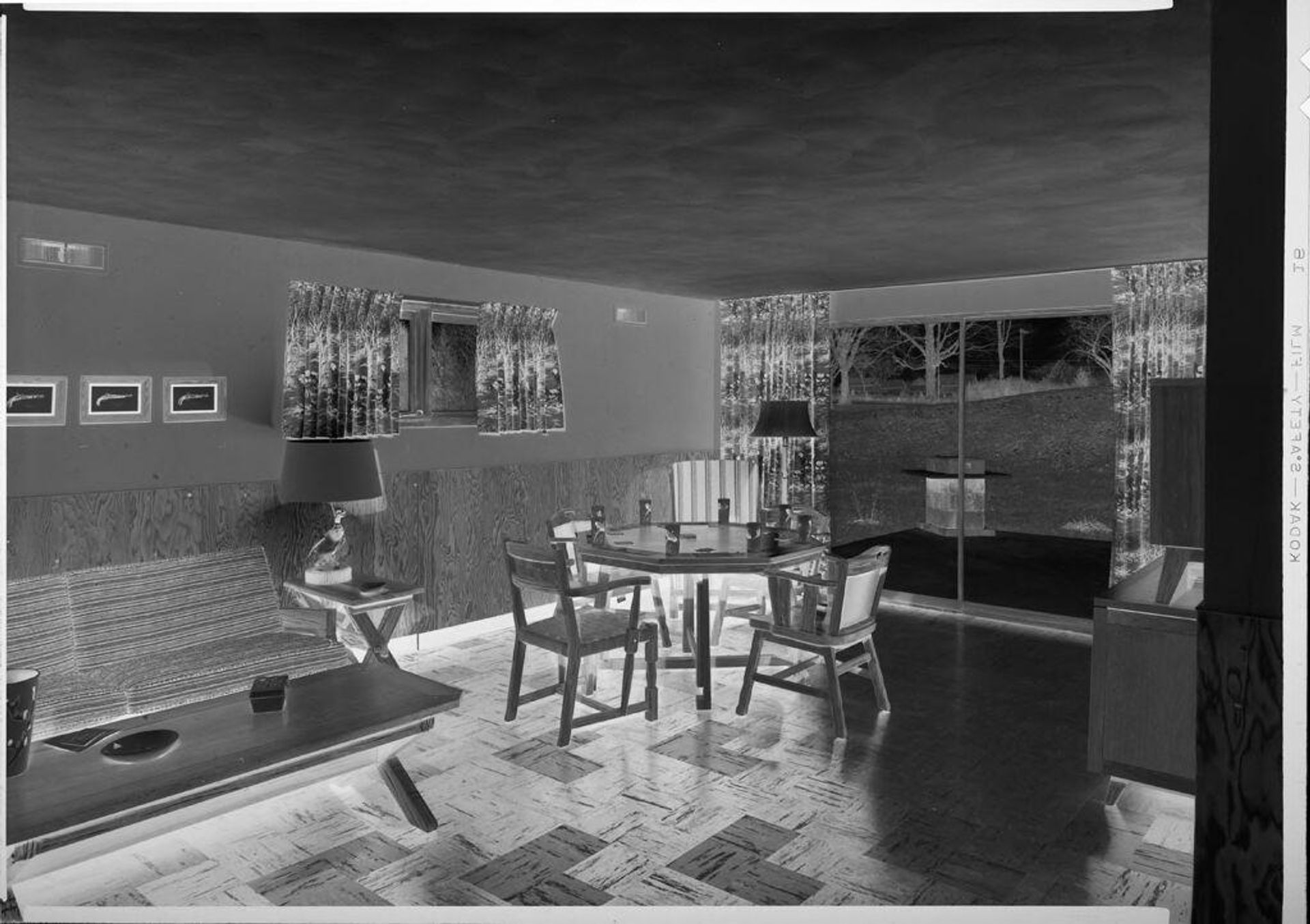 Untitled (living/dining area of small house) by Robert Burian