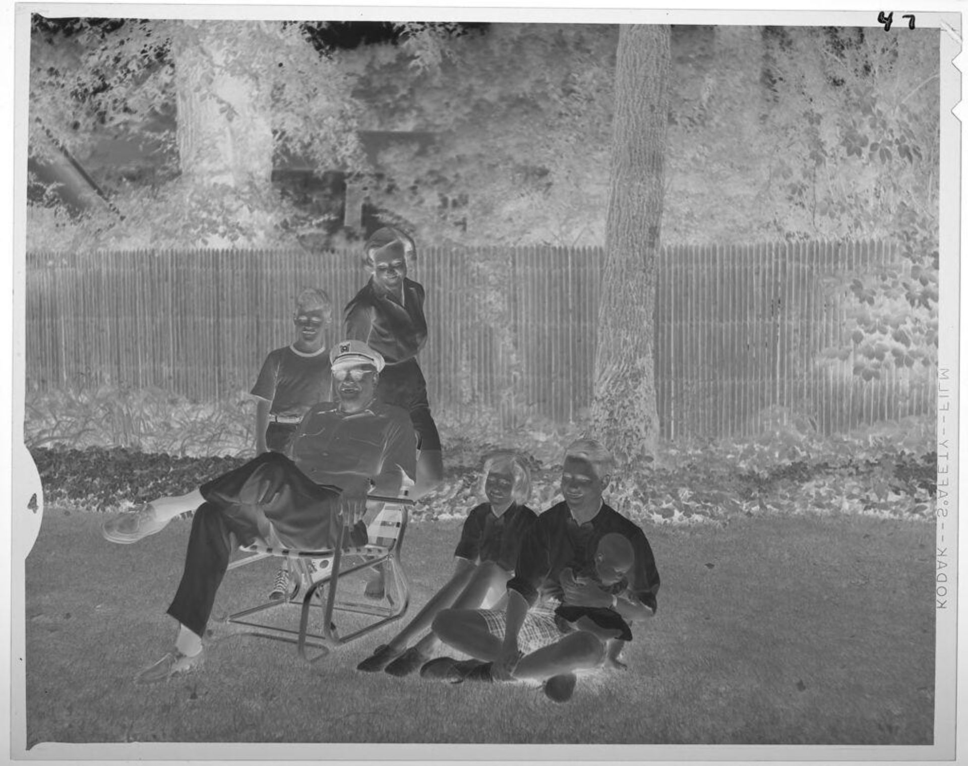 Untitled (portrait of family on lawn) by Lucian and Mary Brown
