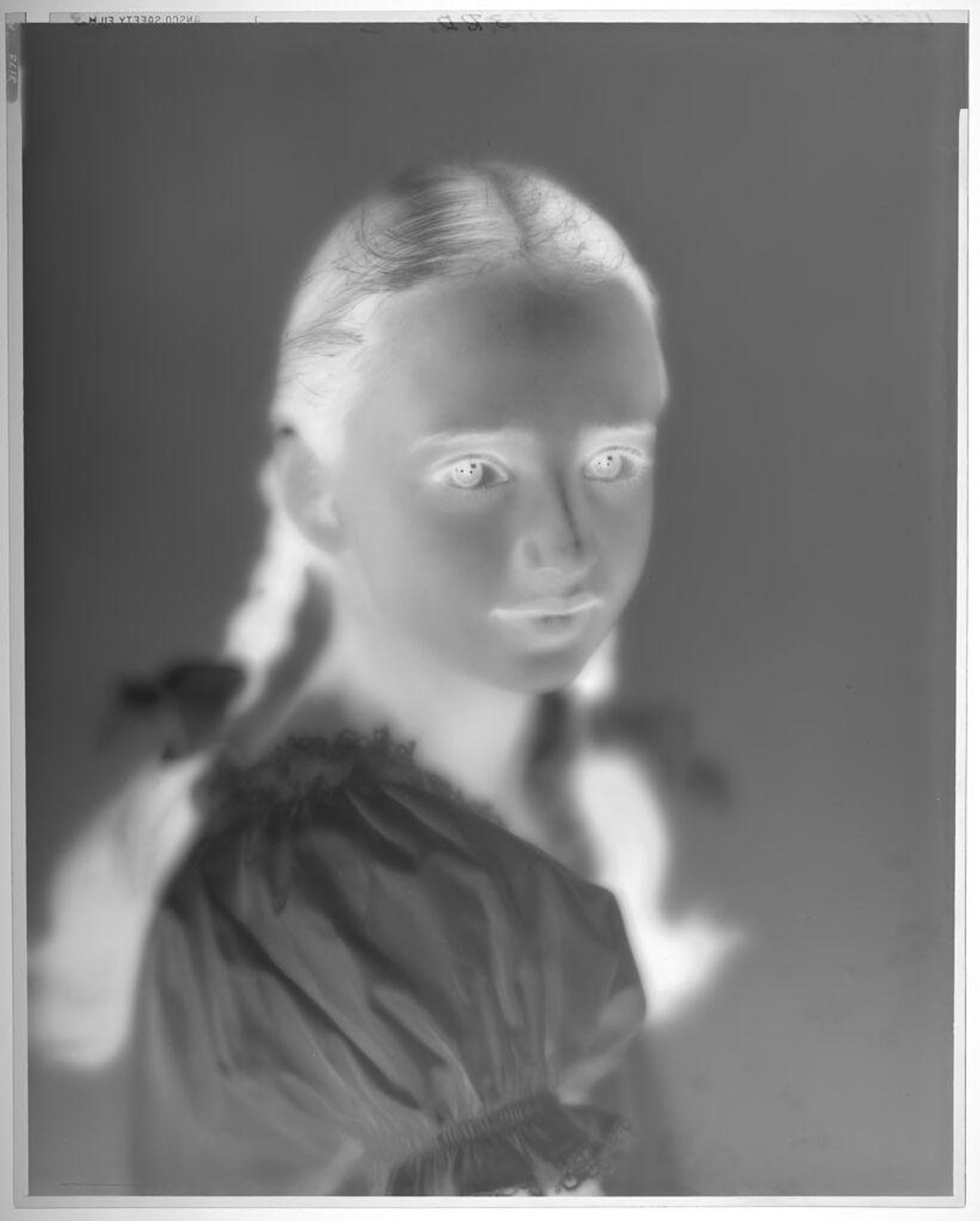 Untitled (portrait of girl in pigtail braids) by Paul Gittings